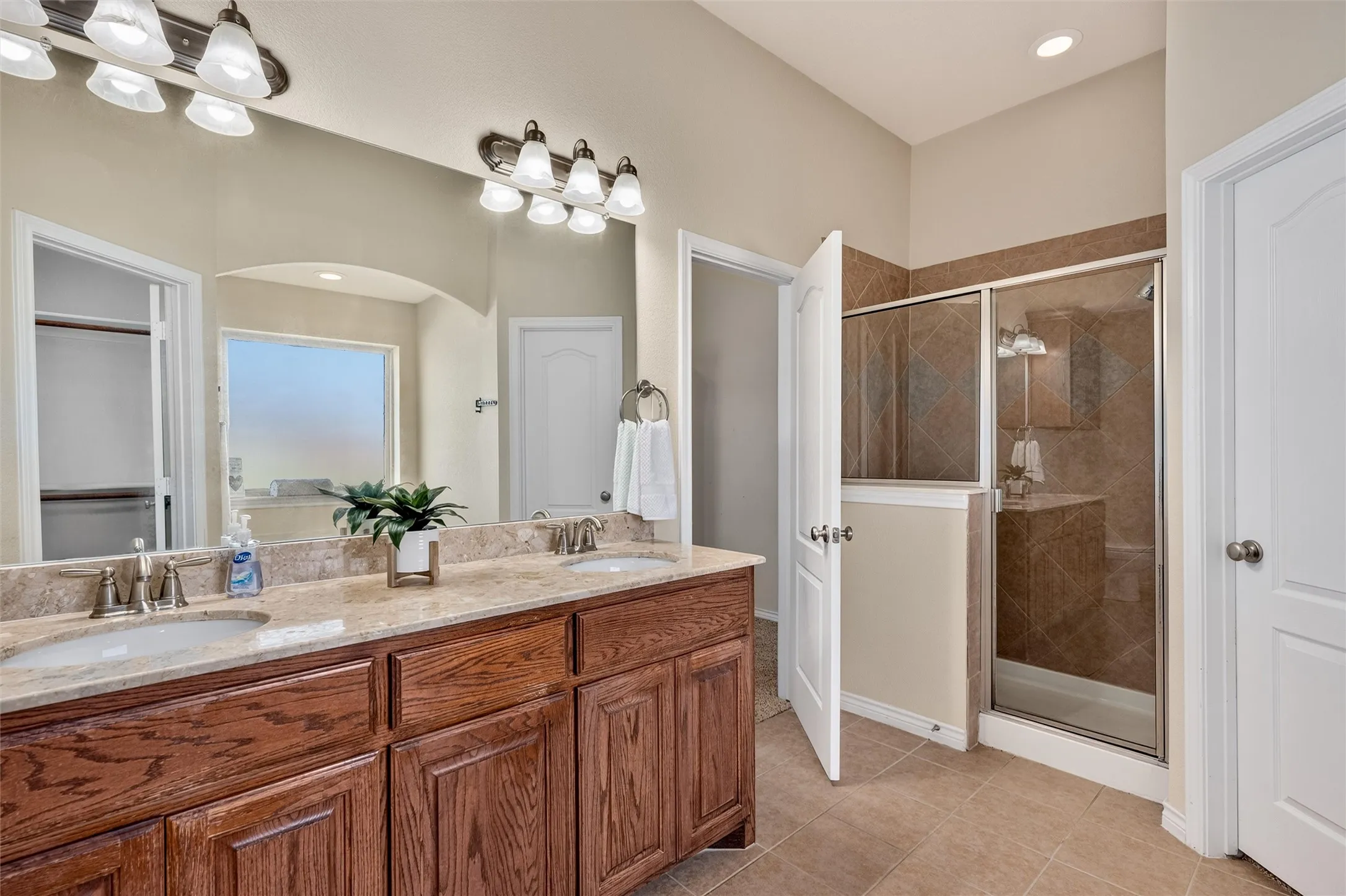 Large walk in shower with seat and built in shampoo holder