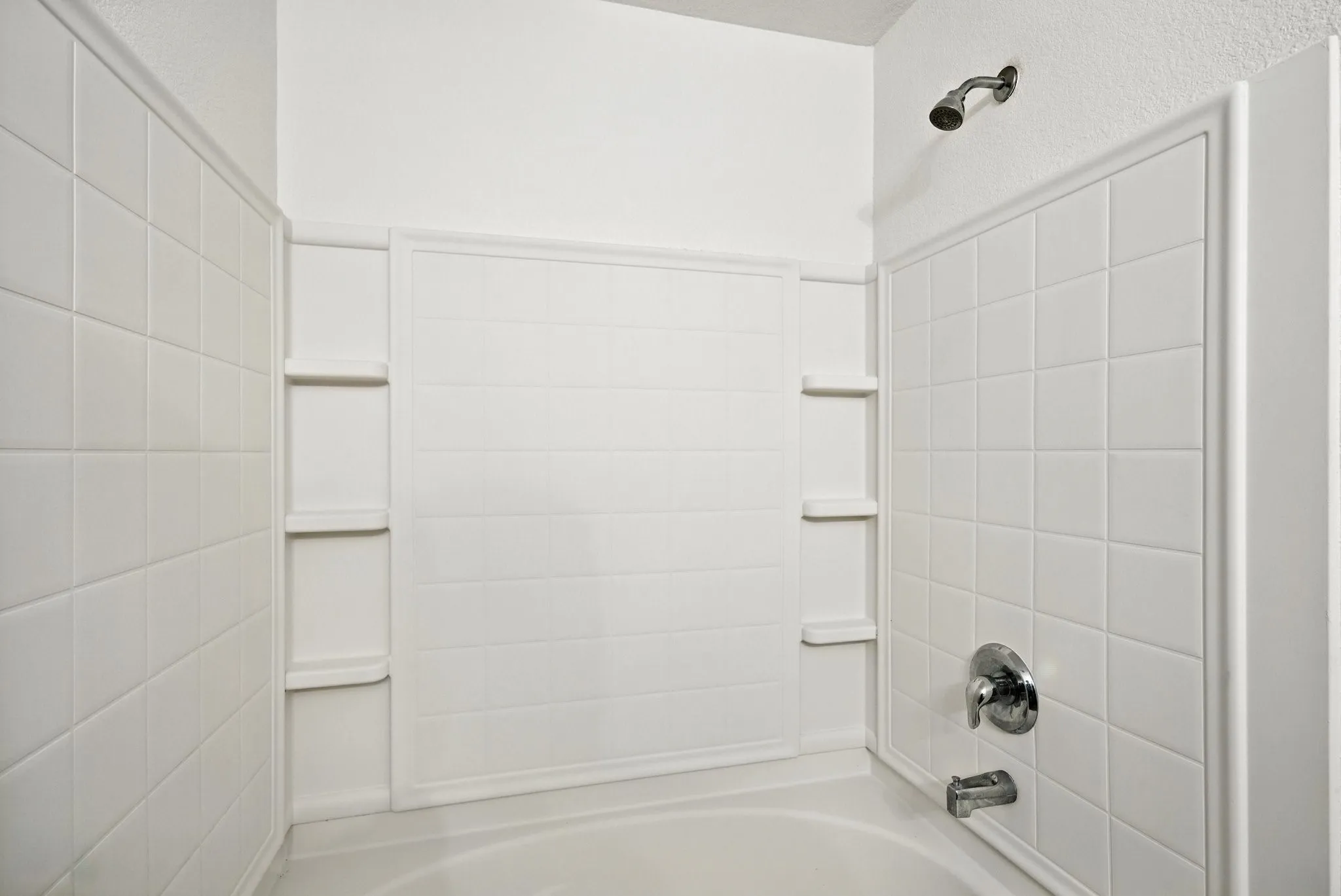 Bathroom featuring  shower combination