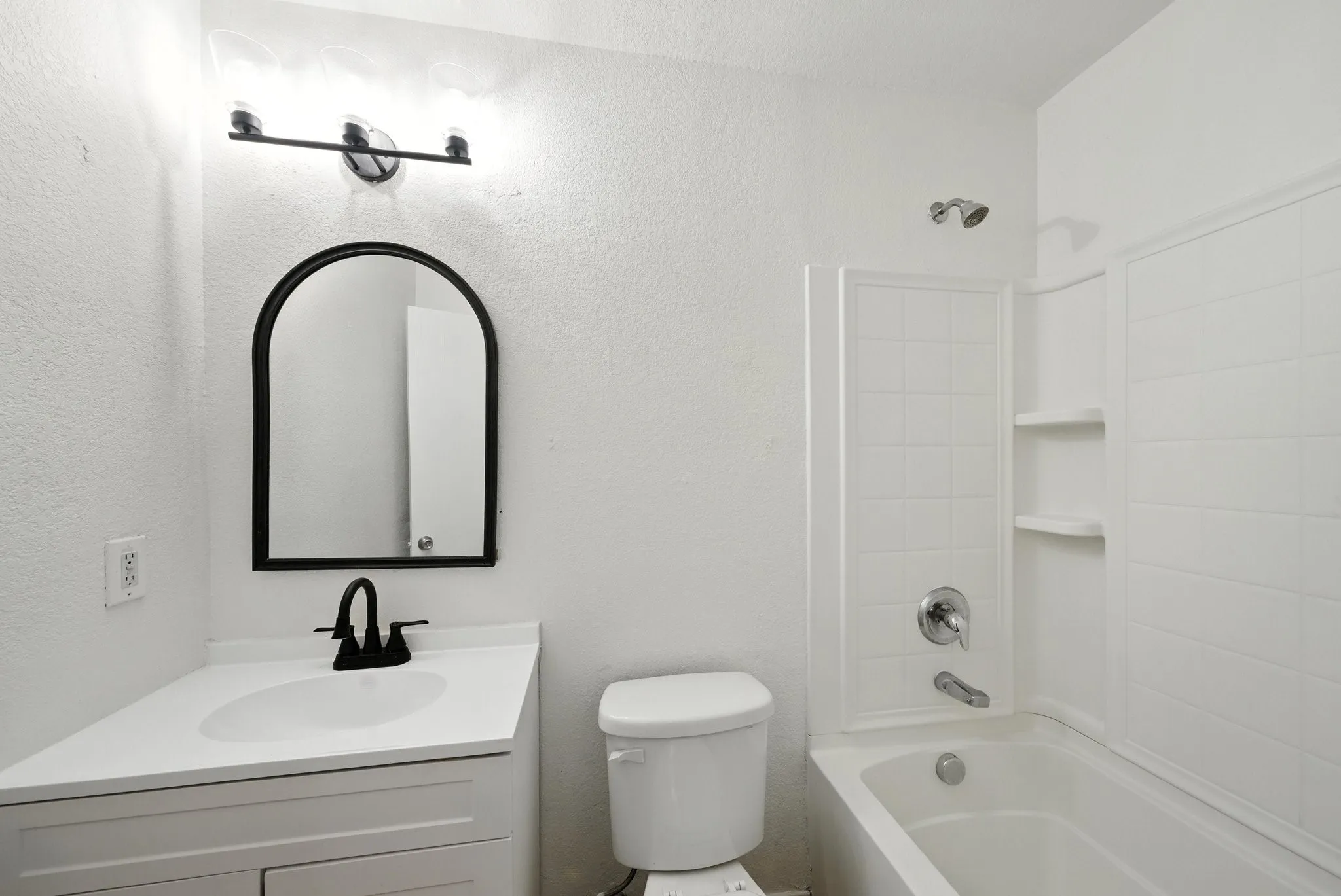 Full bathroom with vanity and shower / washtub combination