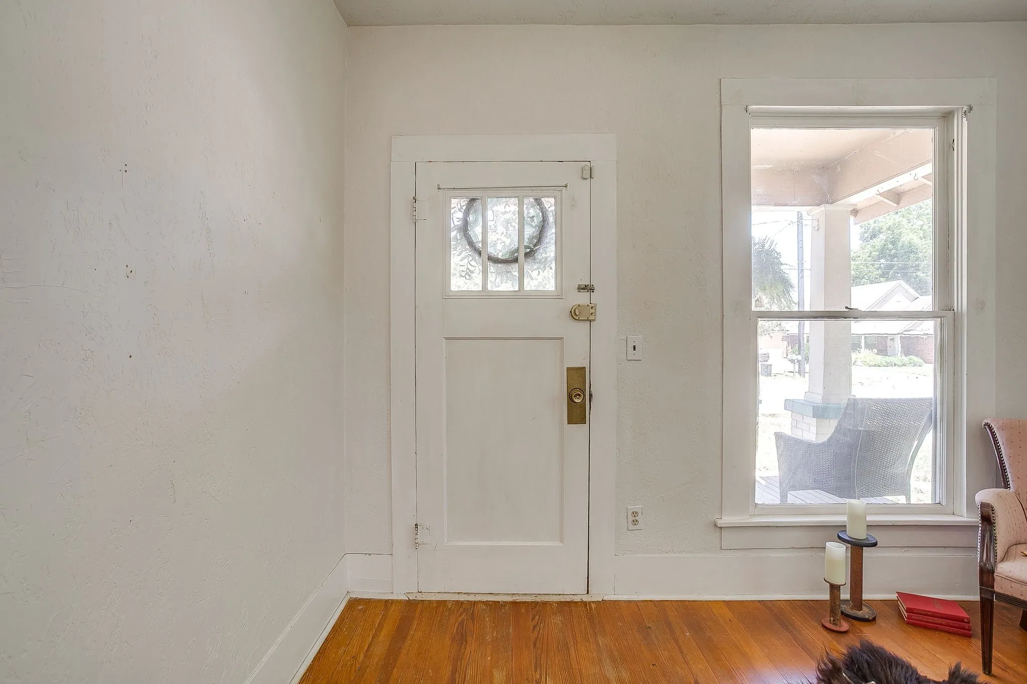 Outdoor entrance to historical side of home.