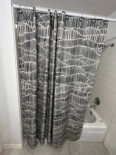 Guest Bathroom with tub in hallway