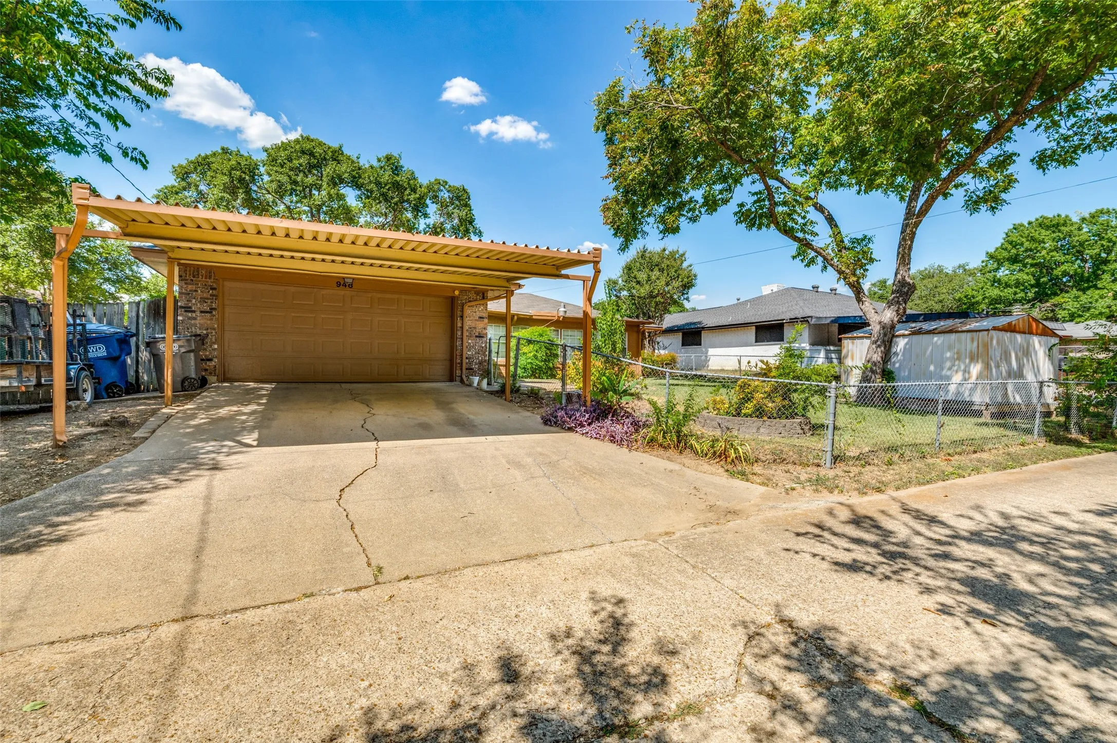 2 car attached garage with a carport provide plenty of covered parking