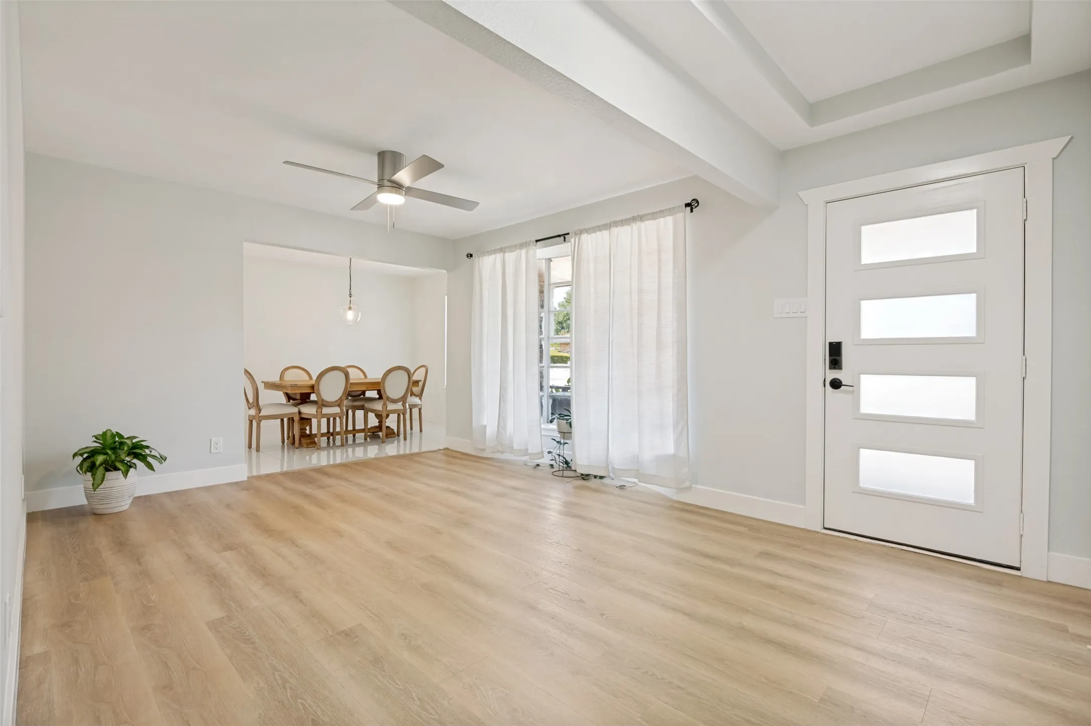 entrance opens up to the formal living room