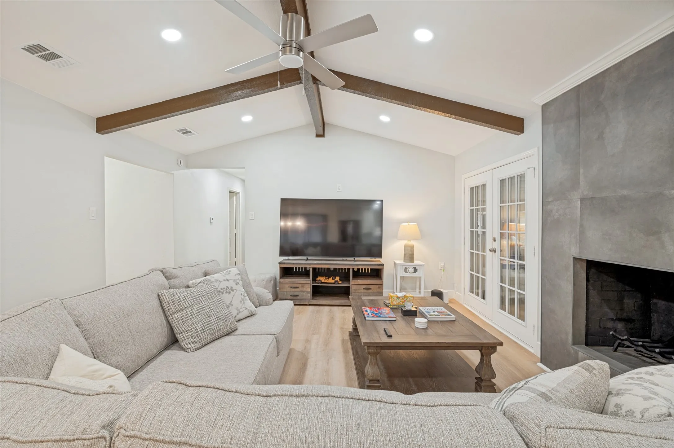 newly resurfaced gas fireplace makes a beautiful focal point
