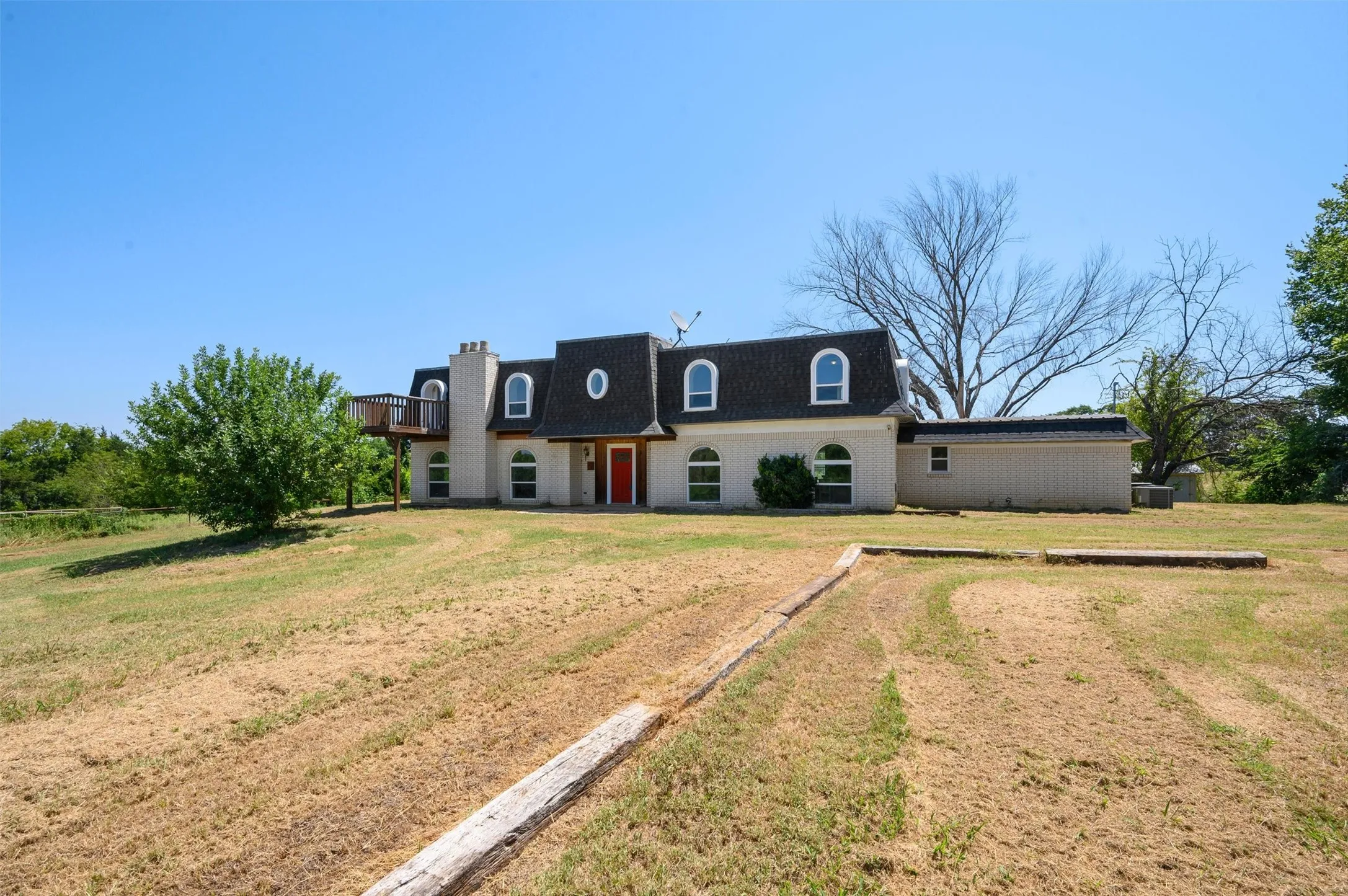 5.93 acre lot with room to play.