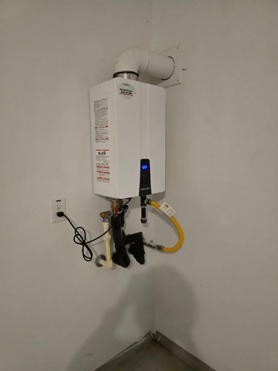 Wall-mounted tankless water heater. Water is always hot and tankless water heaters saves on your water bills