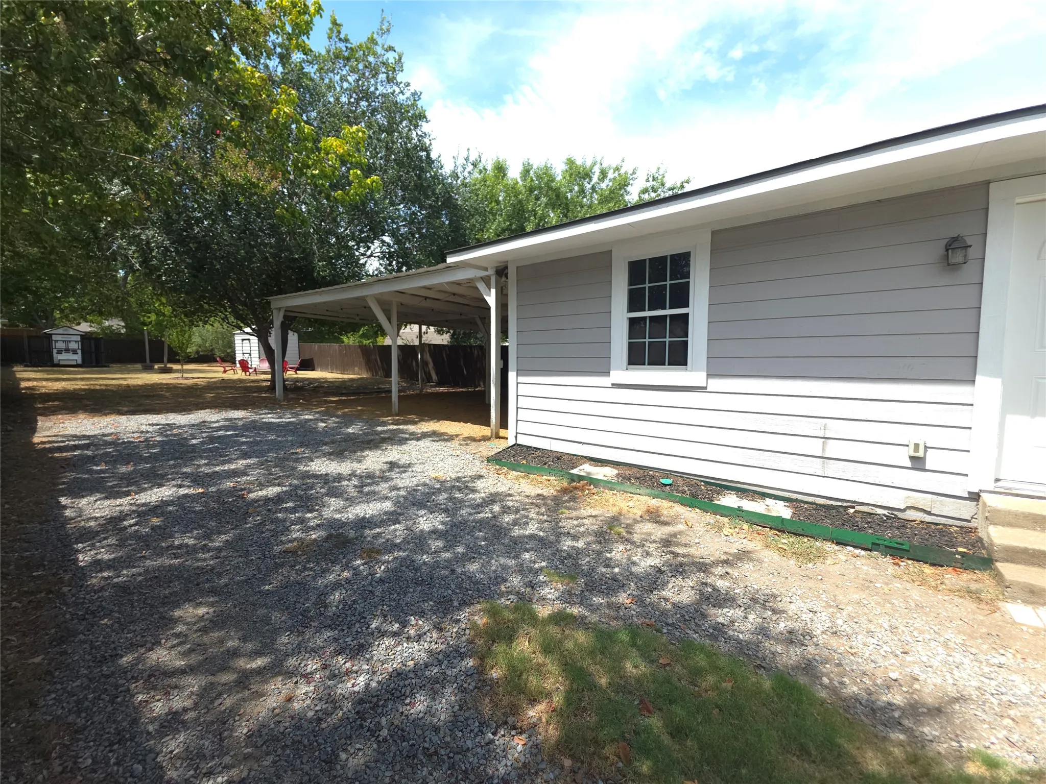 Step outside to see this incredibly spacious backyard
