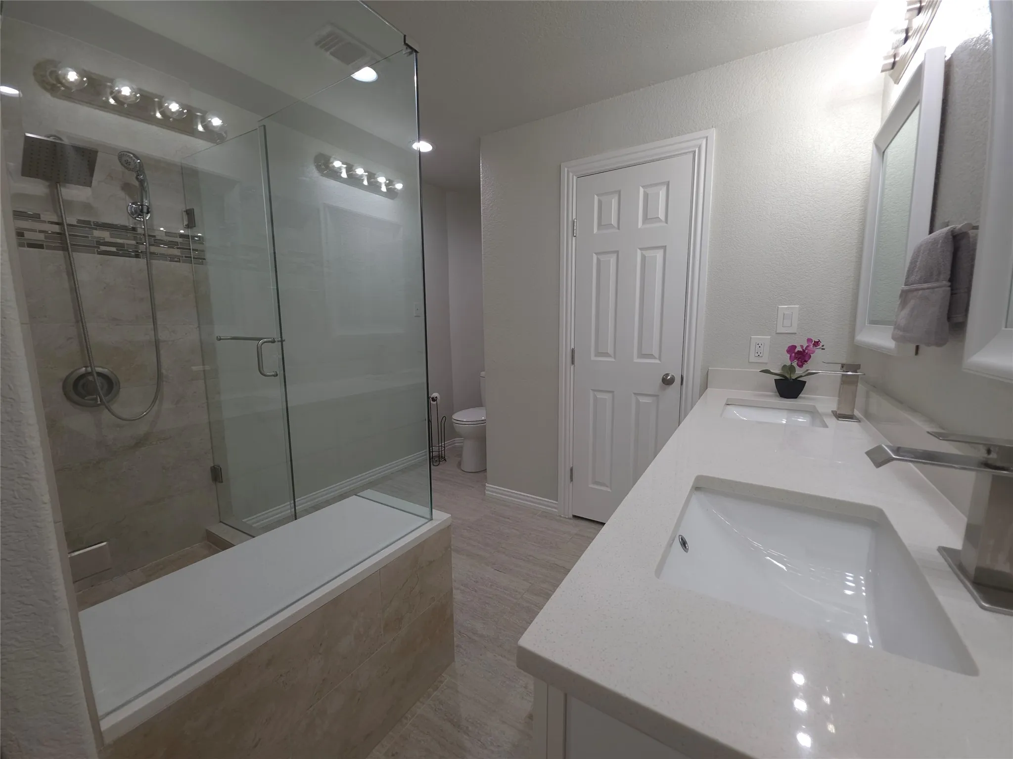 Dual sinks in this great primary bathroom