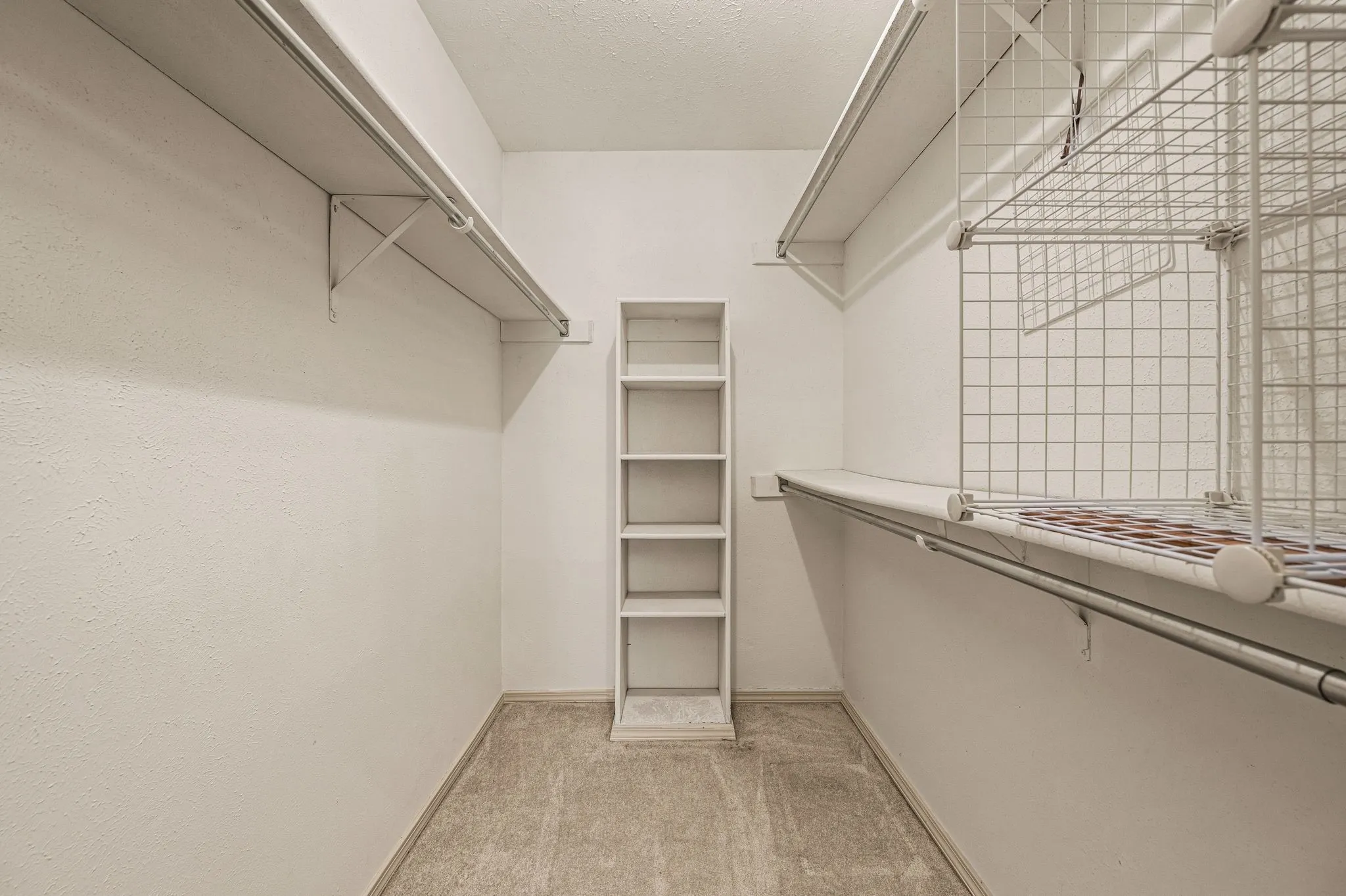 Large walk-in closet in primary bathroom