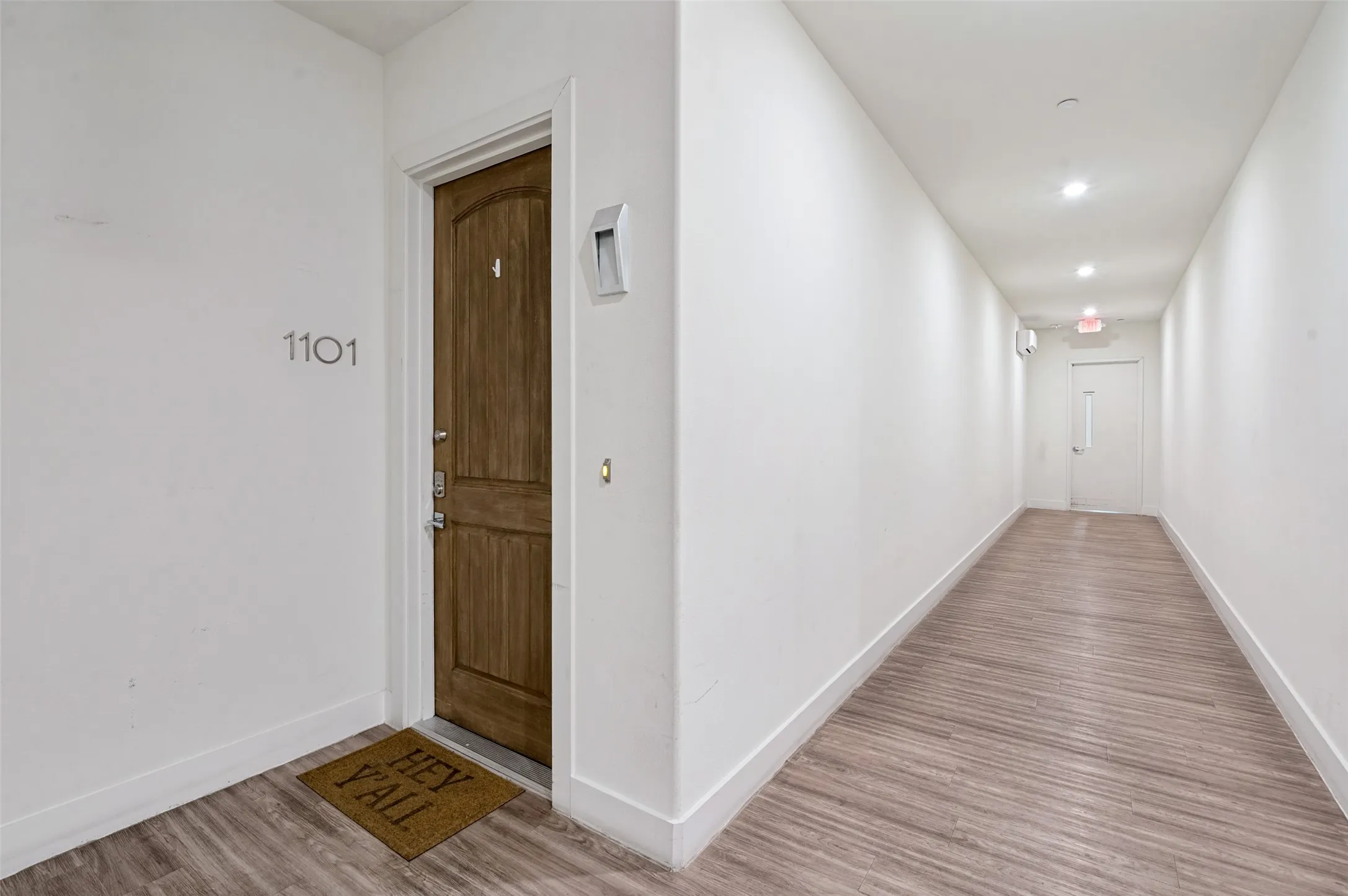 Enter from a private hallway after exiting the elevator