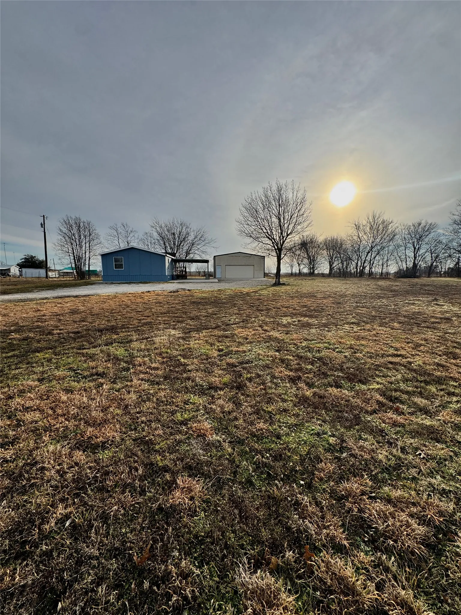 View of yard featuring a garage