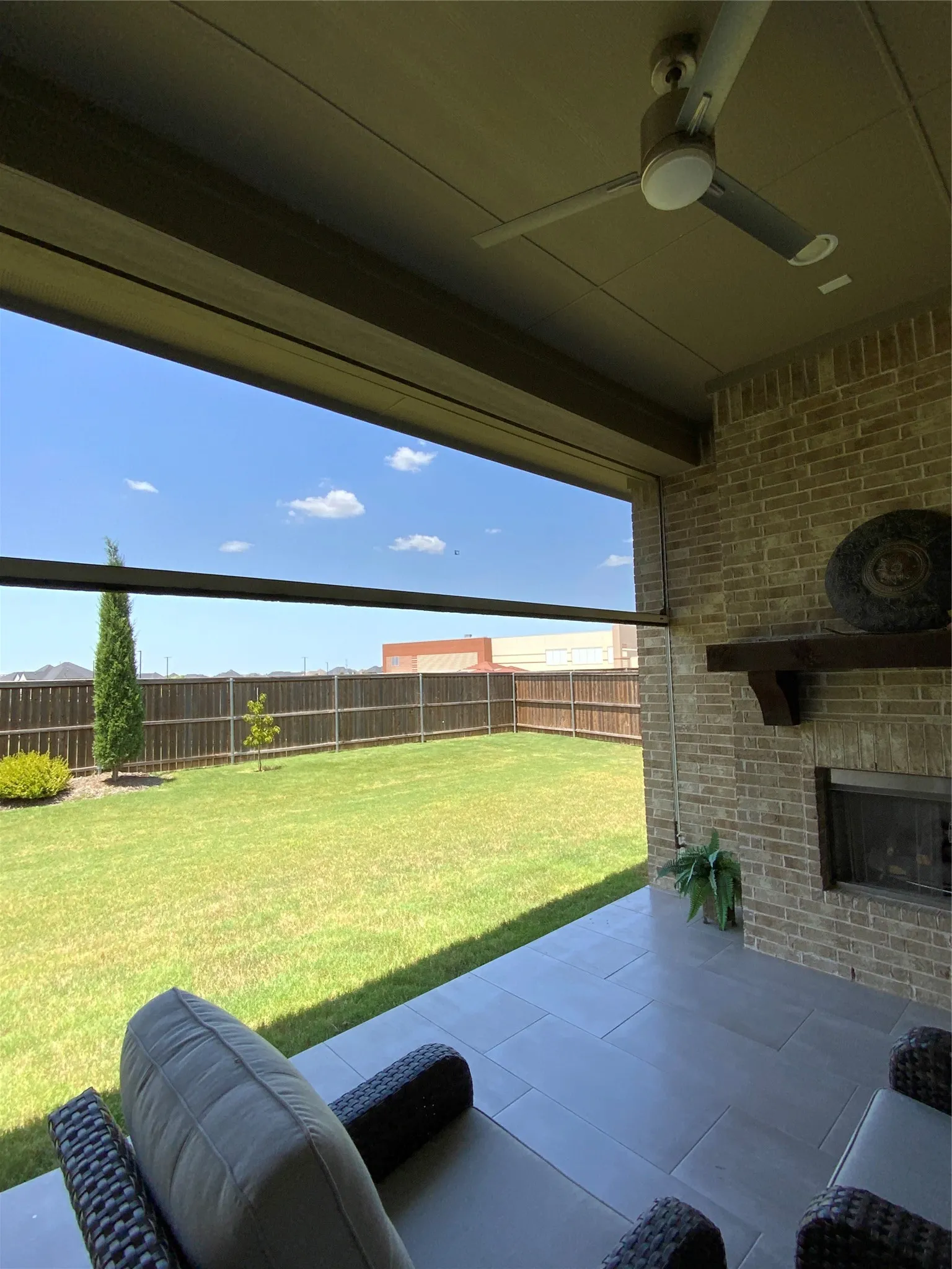 Patio with fireplace and remote control screen