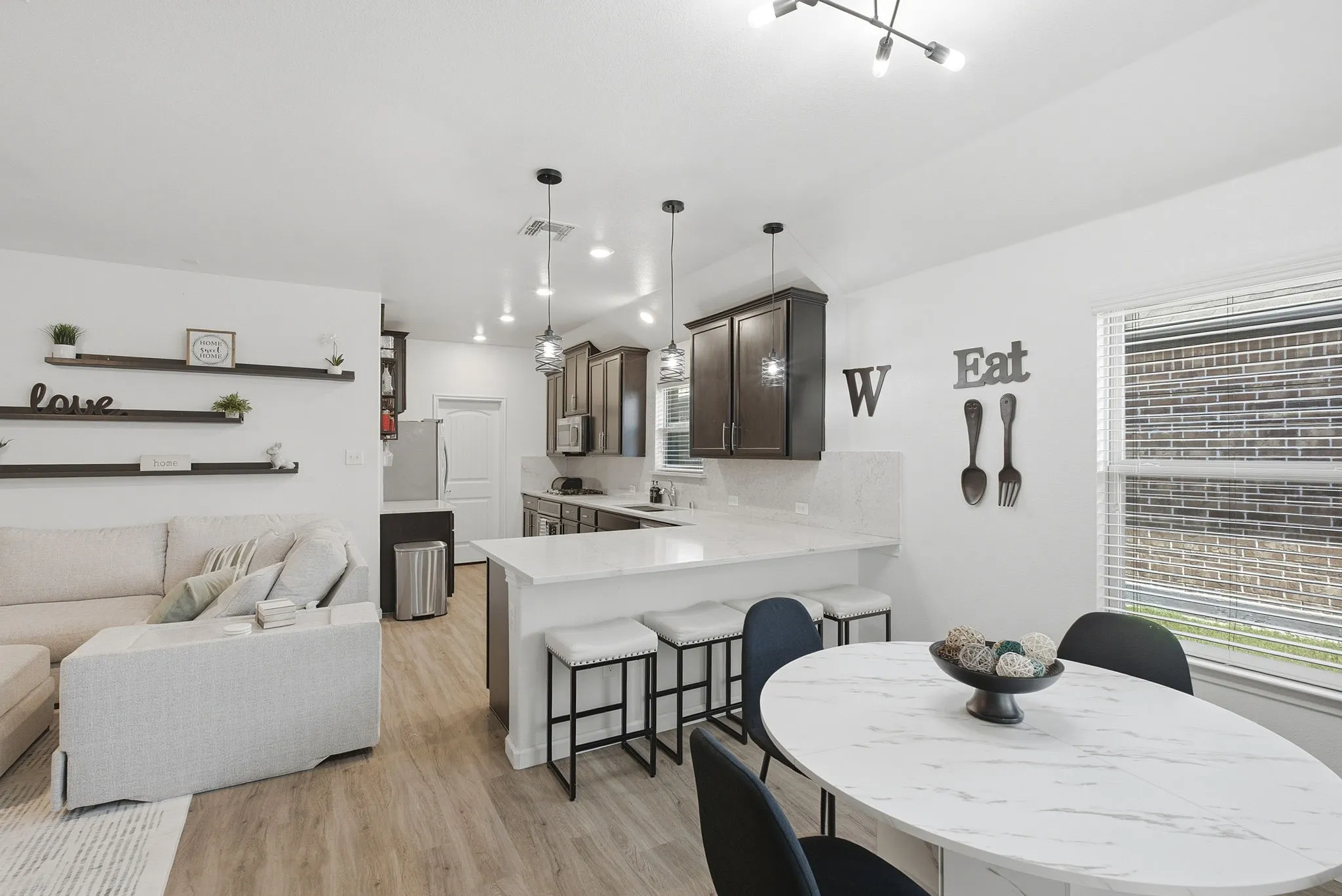 Breakfast area, kitchen and living space are all open to each other