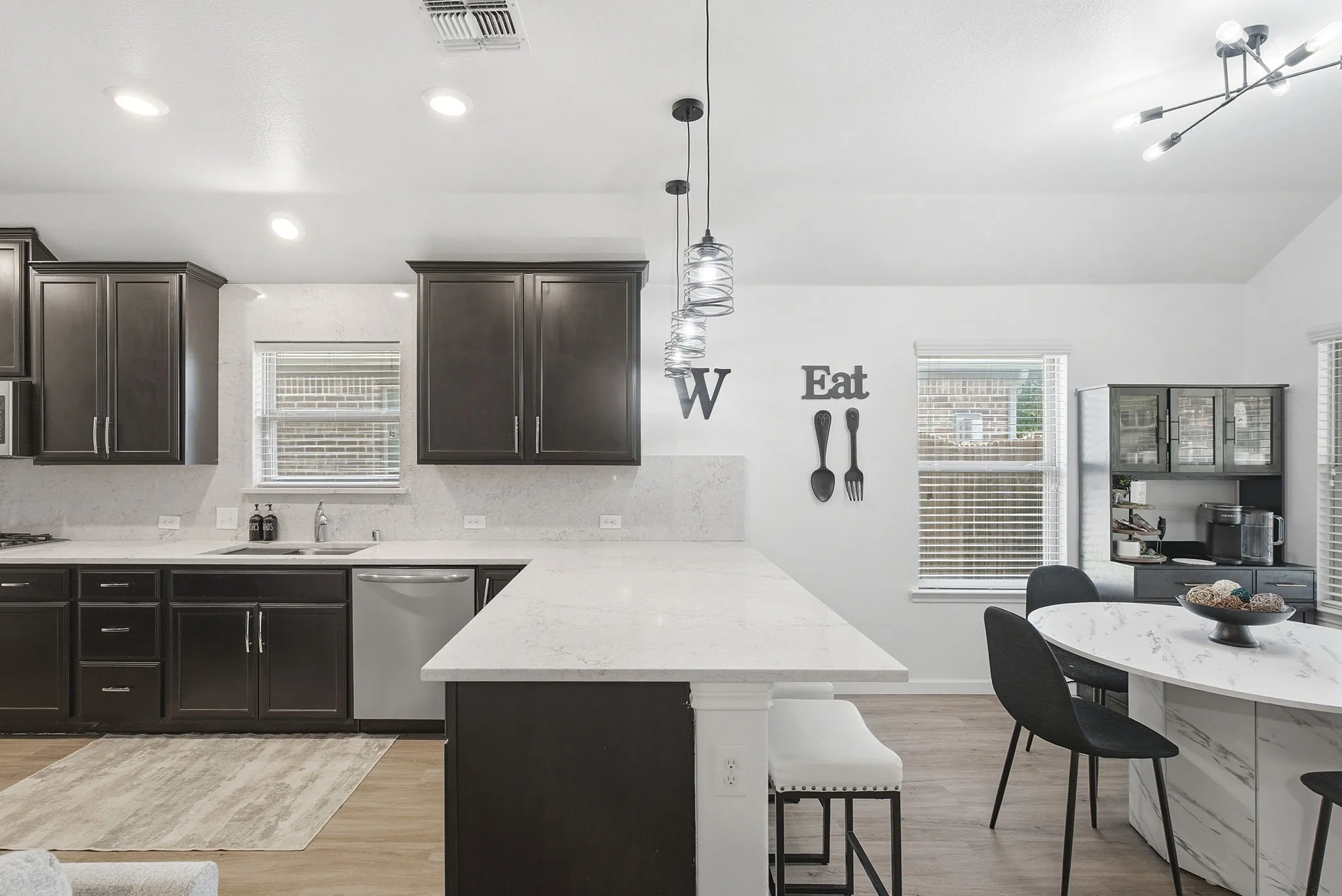 Remodeled kitchen with newer quartz counters