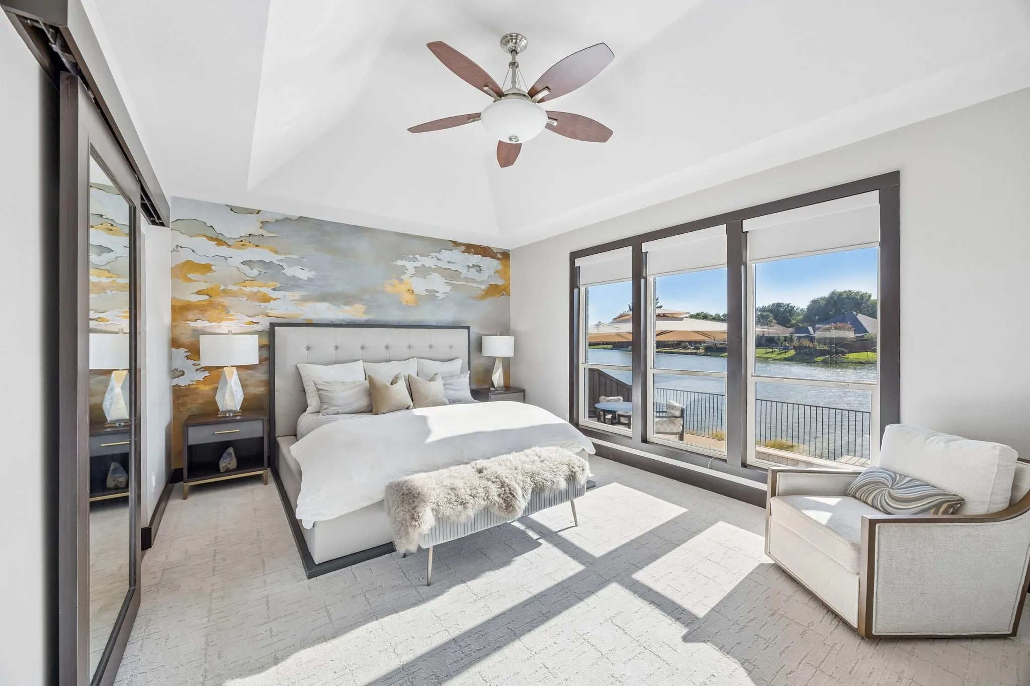 The redesigned primary suite offers peaceful water views + a spa-inspired bath with an oversized glass-enclosed shower + BainUltra therapeutic air-jet bath w/ integrated aromatherapy + chromotherapy.