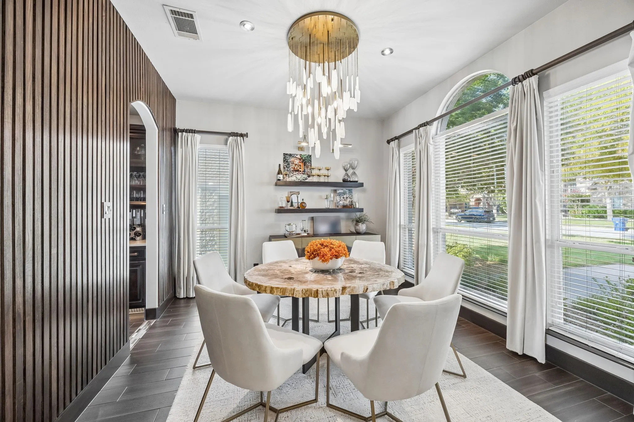 Combines designer style with everyday functionality. Its connection to the kitchen and main living areas creates an easy flow for gatherings.