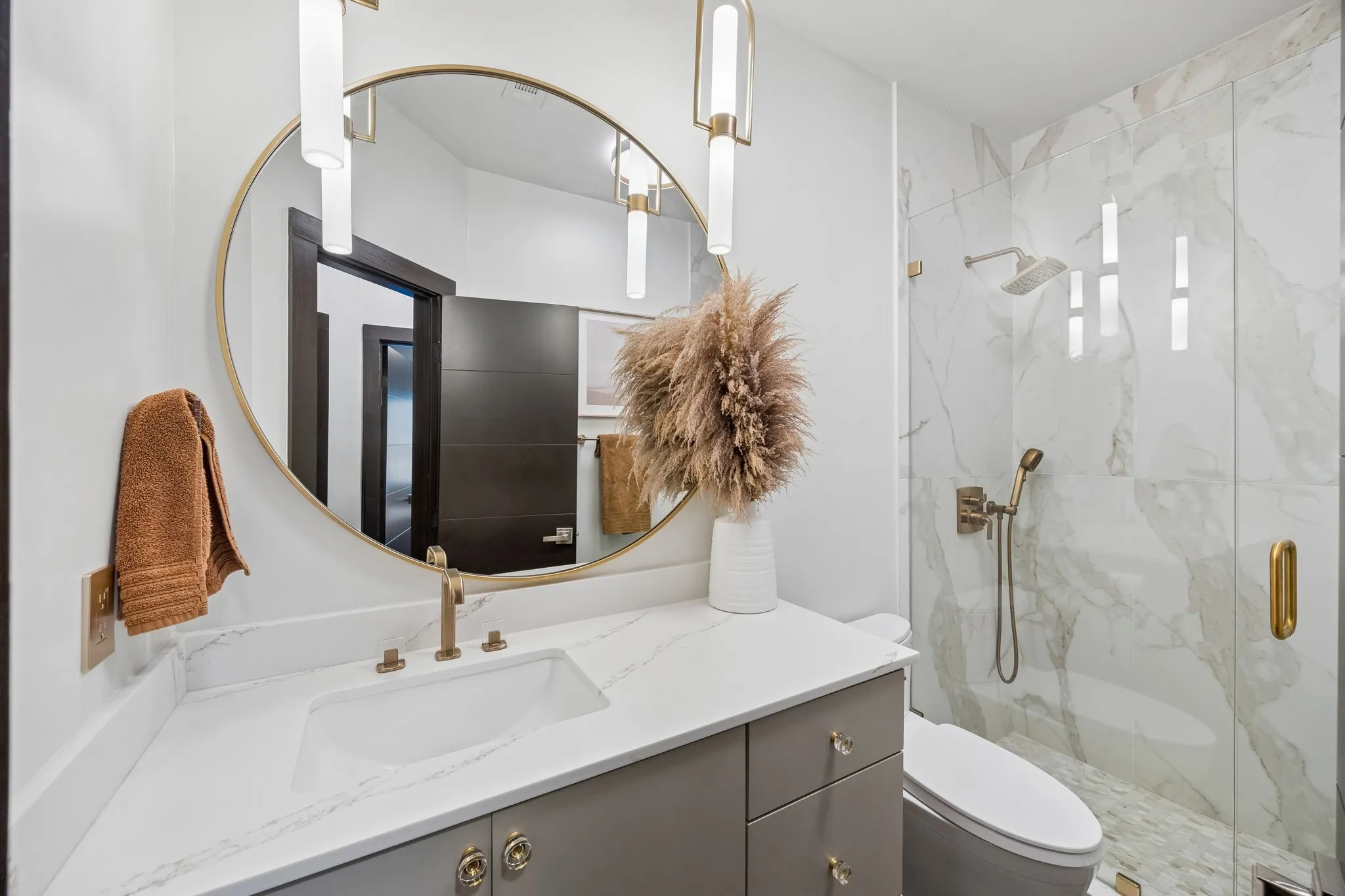 Guest bath downstairs with large shower.