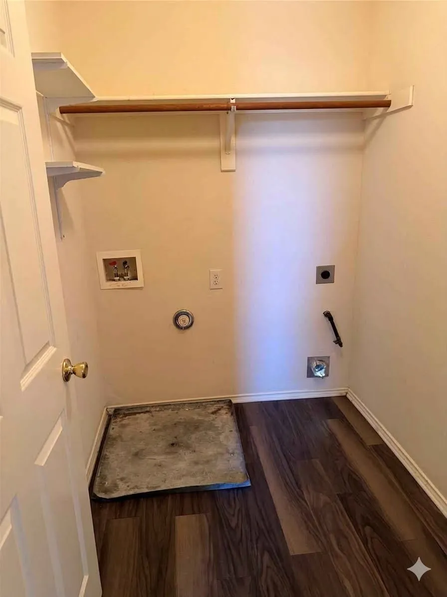 Wood-finish flooring, built-in shelving, and a clothing rod