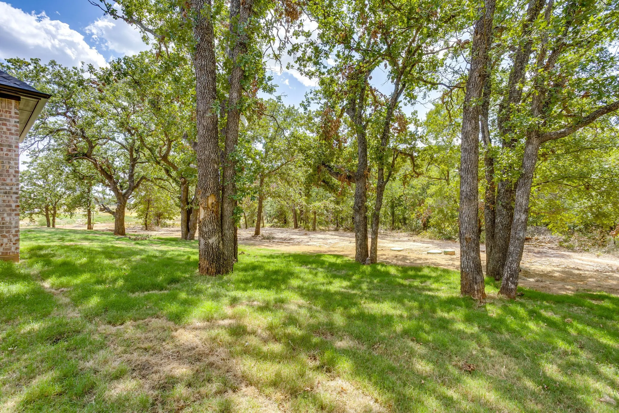 One acre featuring mature trees and privacy!