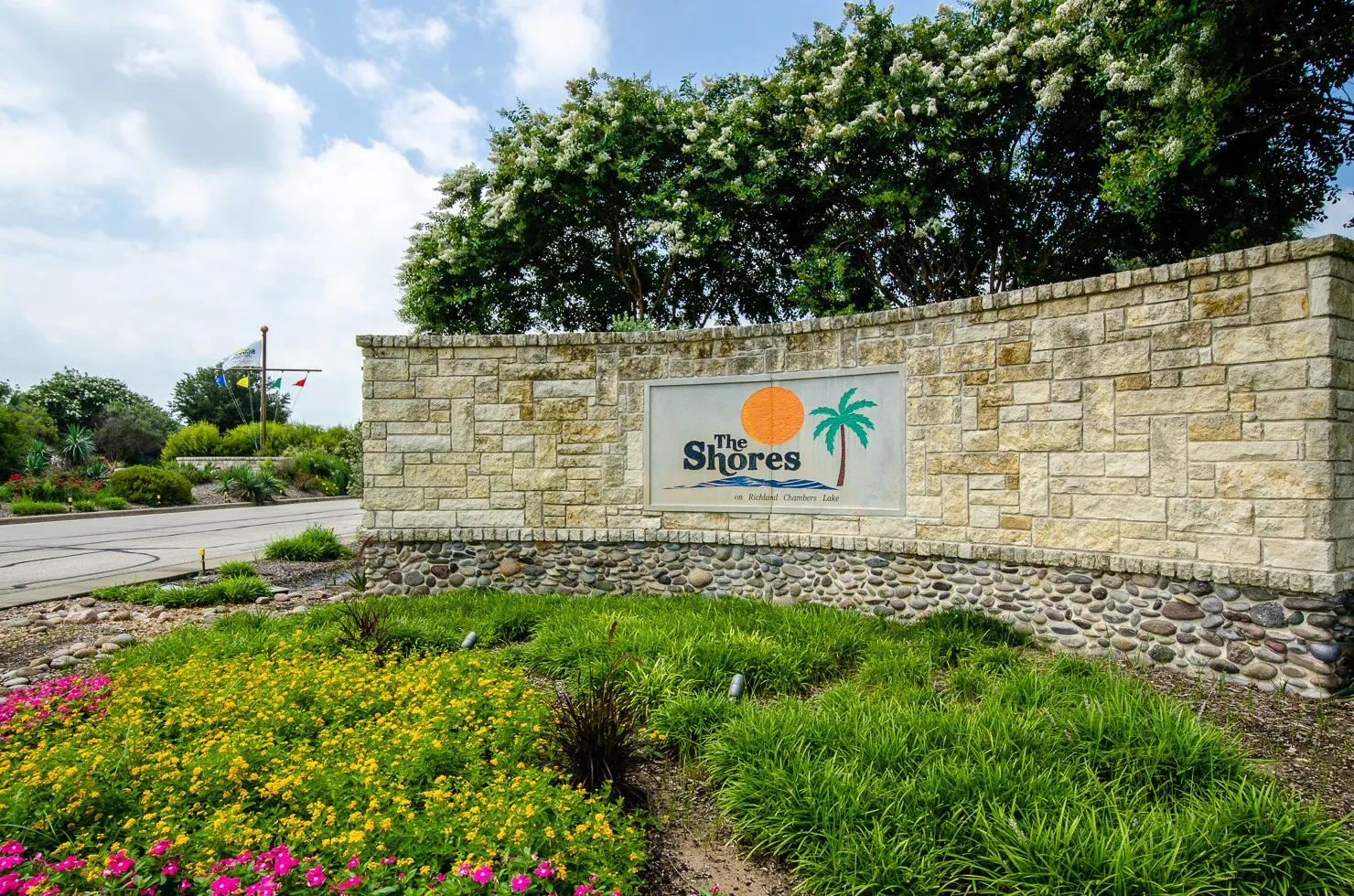 Gated entrance to The Shores, a desirable Richland Chambers Lake community offering an inviting setting for full-time and second-home living.