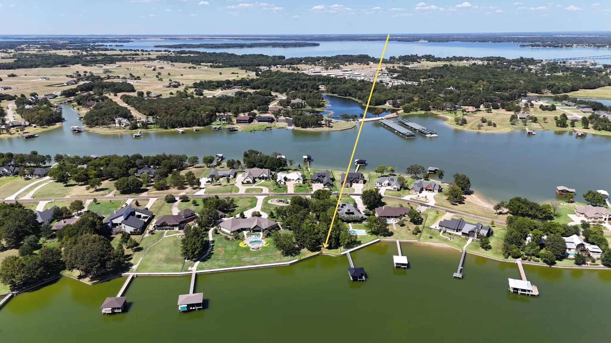 Established lake neighborhood surrounds this Richland Chambers Lake property, ideal for creating a Texas second-home retreat.