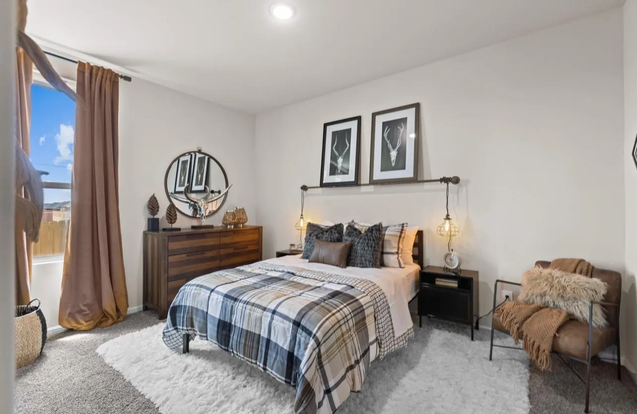 Carpeted bedroom featuring baseboards and recessed lighting