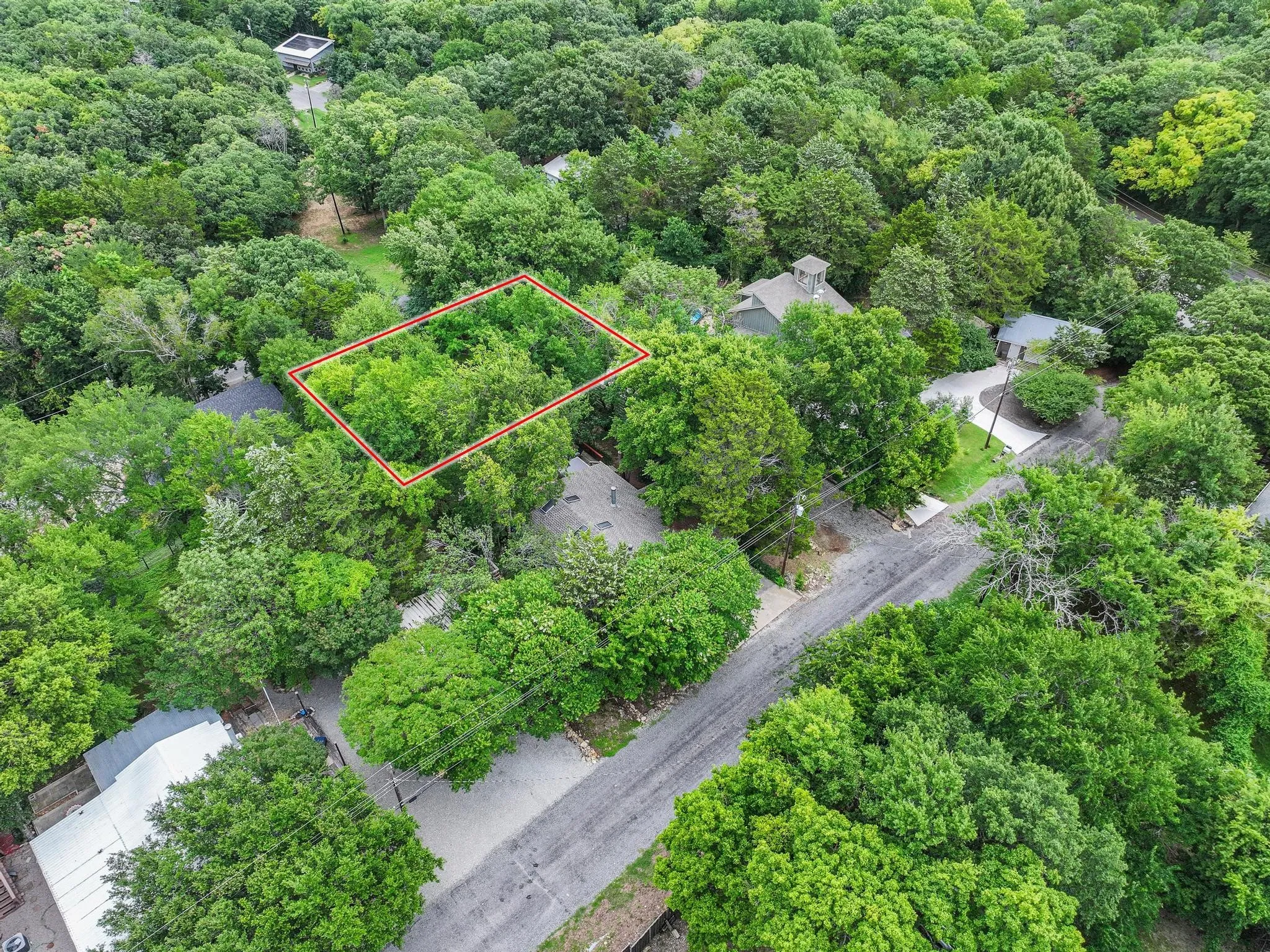 Wooded lot outlined in red