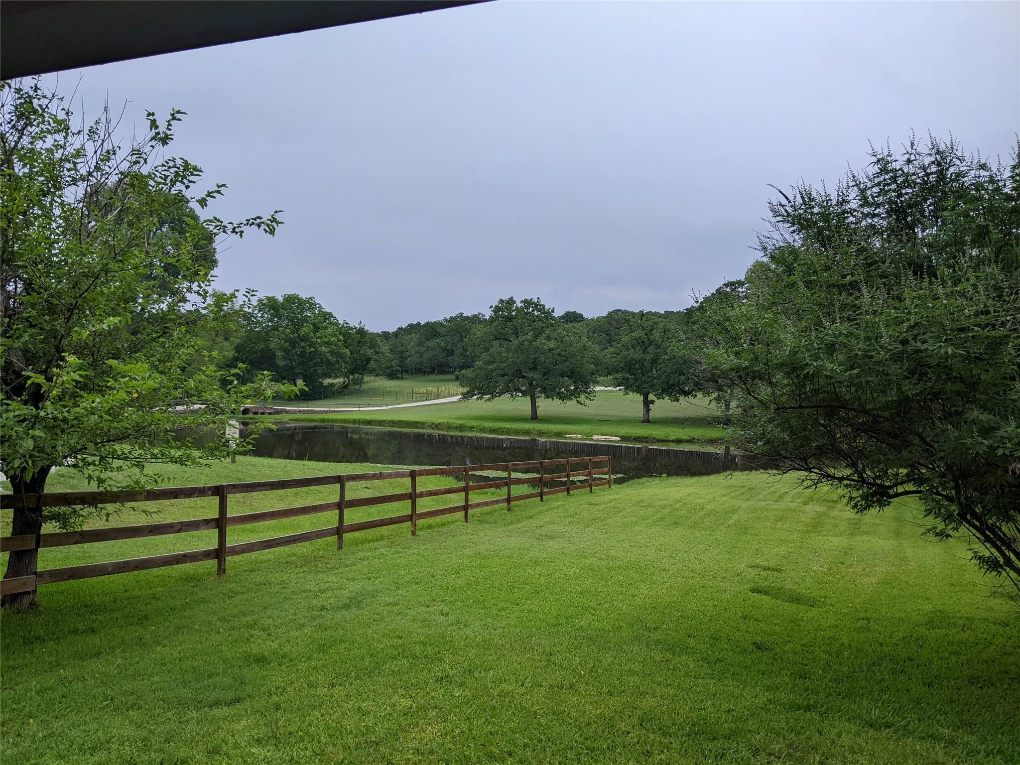 View of privately owned, neighboring pond