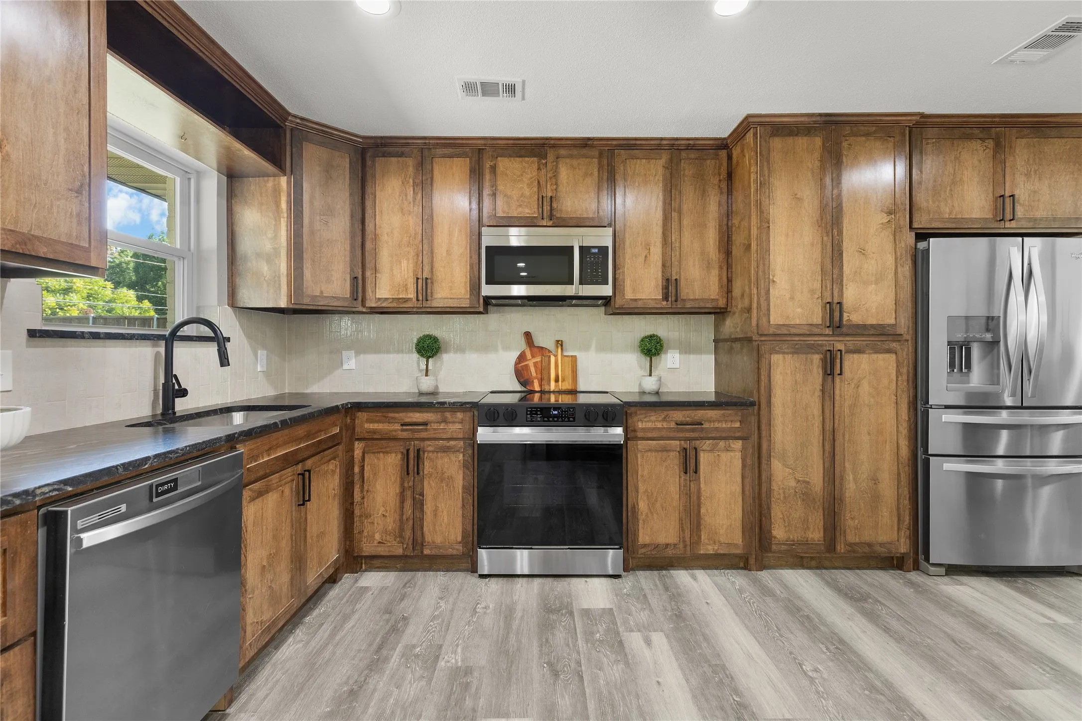 Custom soft close cabinets and smart stove