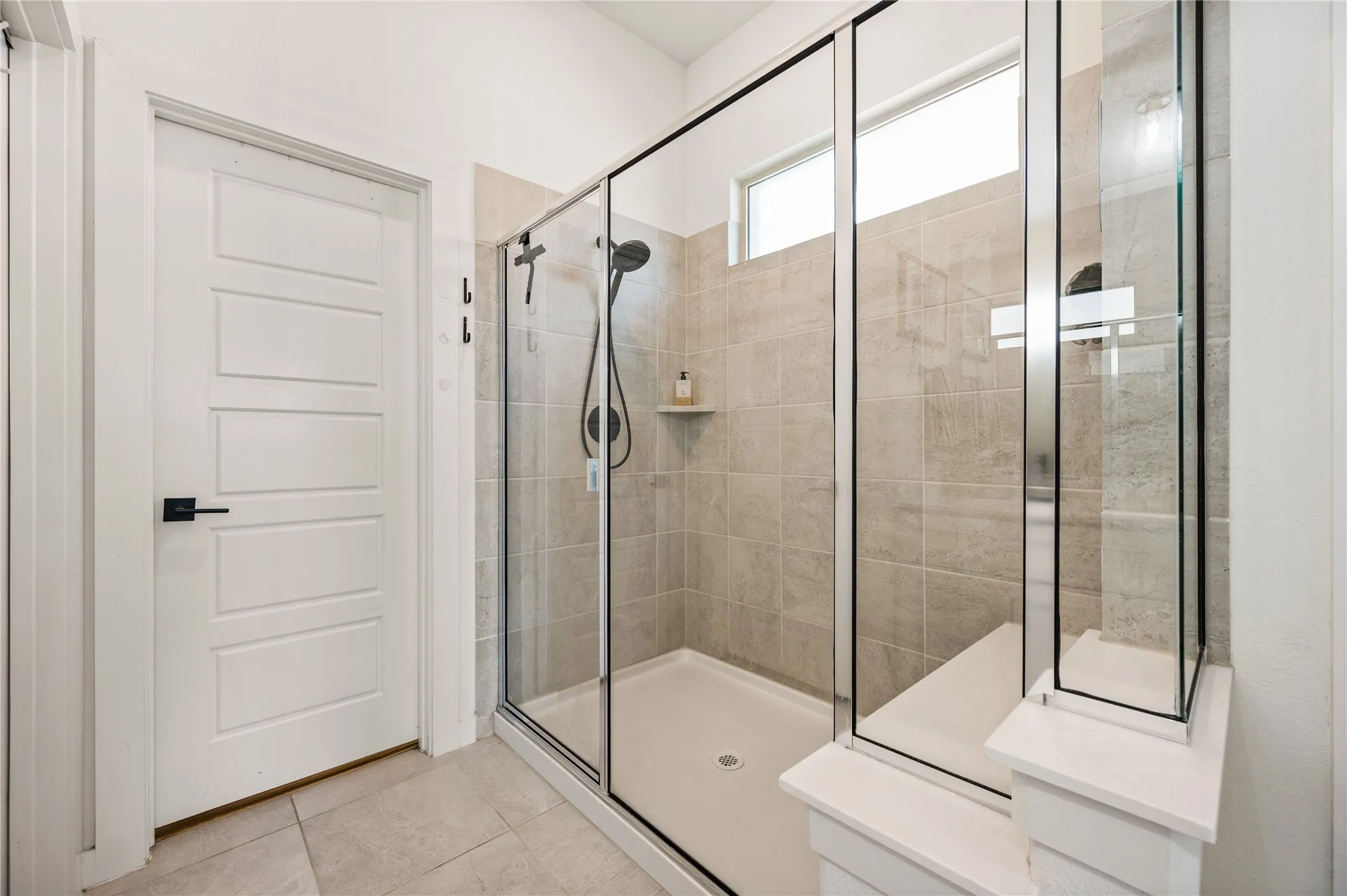 Extended shower. Closet entry. His and hers dual sinks.