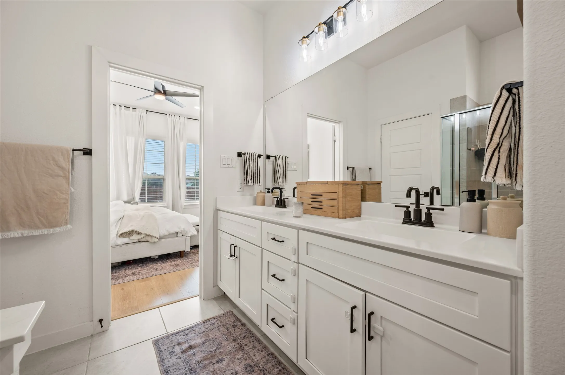 Extended shower. Closet entry. His and hers dual sinks.