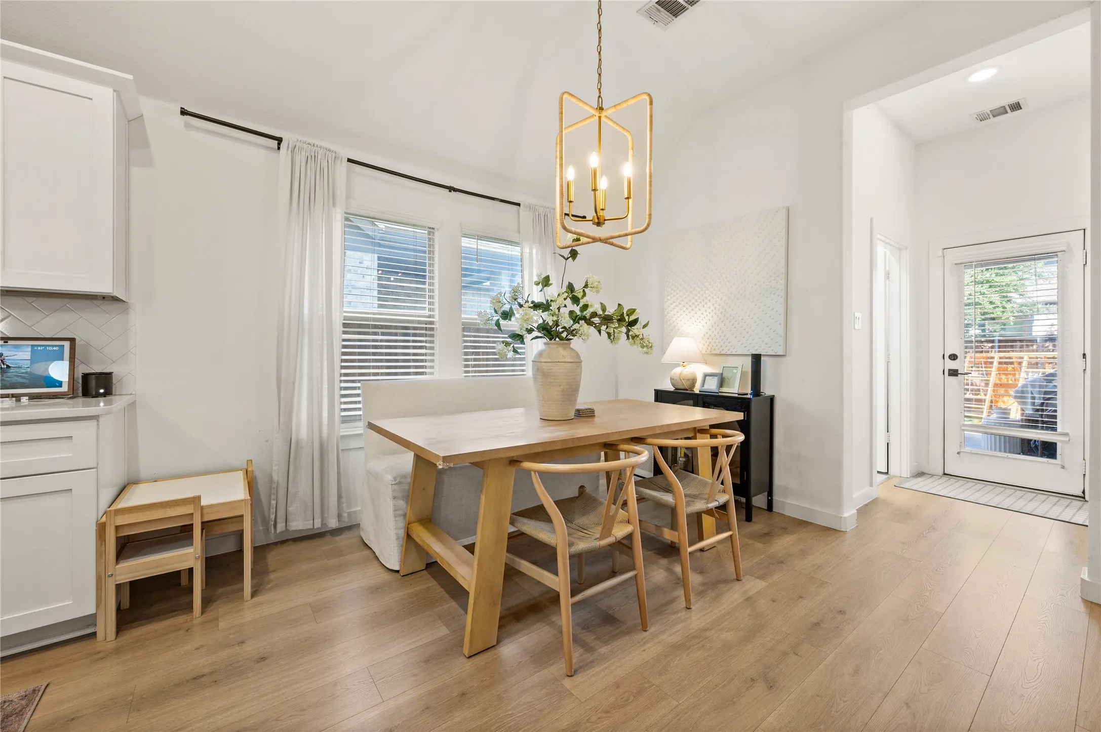 Designated dining area with windows for natural light.