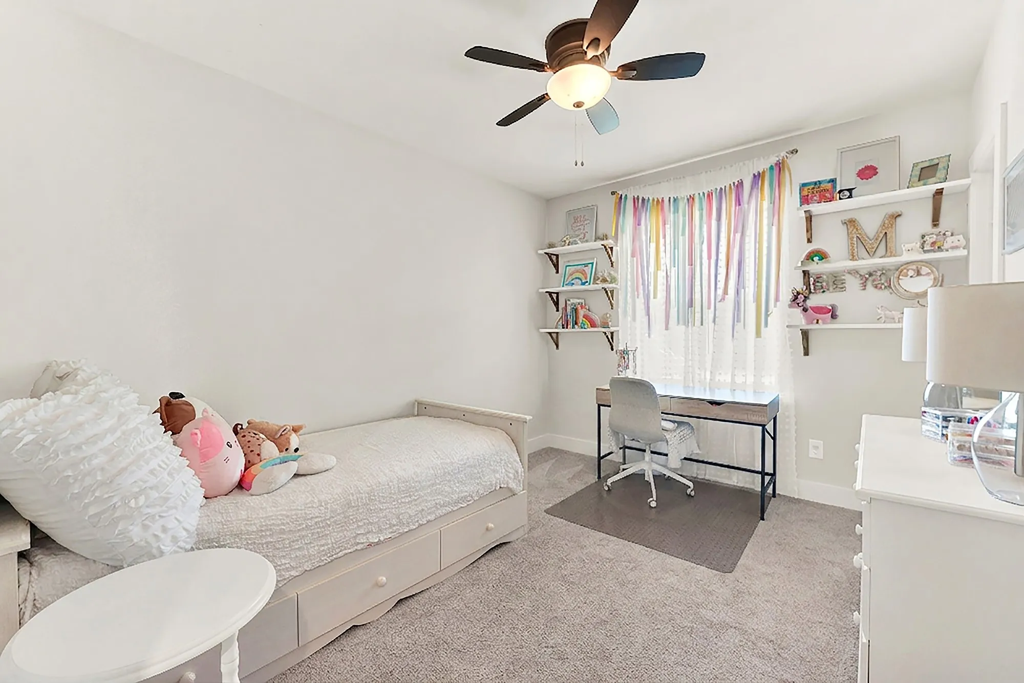 Recessed lighting, ceiling fan, built-in shelving, carpet flooring, and a window with natural​​‌​​​​‌​​‌‌​‌‌​​​‌‌​‌​‌​‌​​​‌​​ light