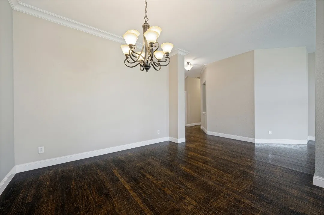 Dark wood-finish flooring with a semi-gloss sheen
