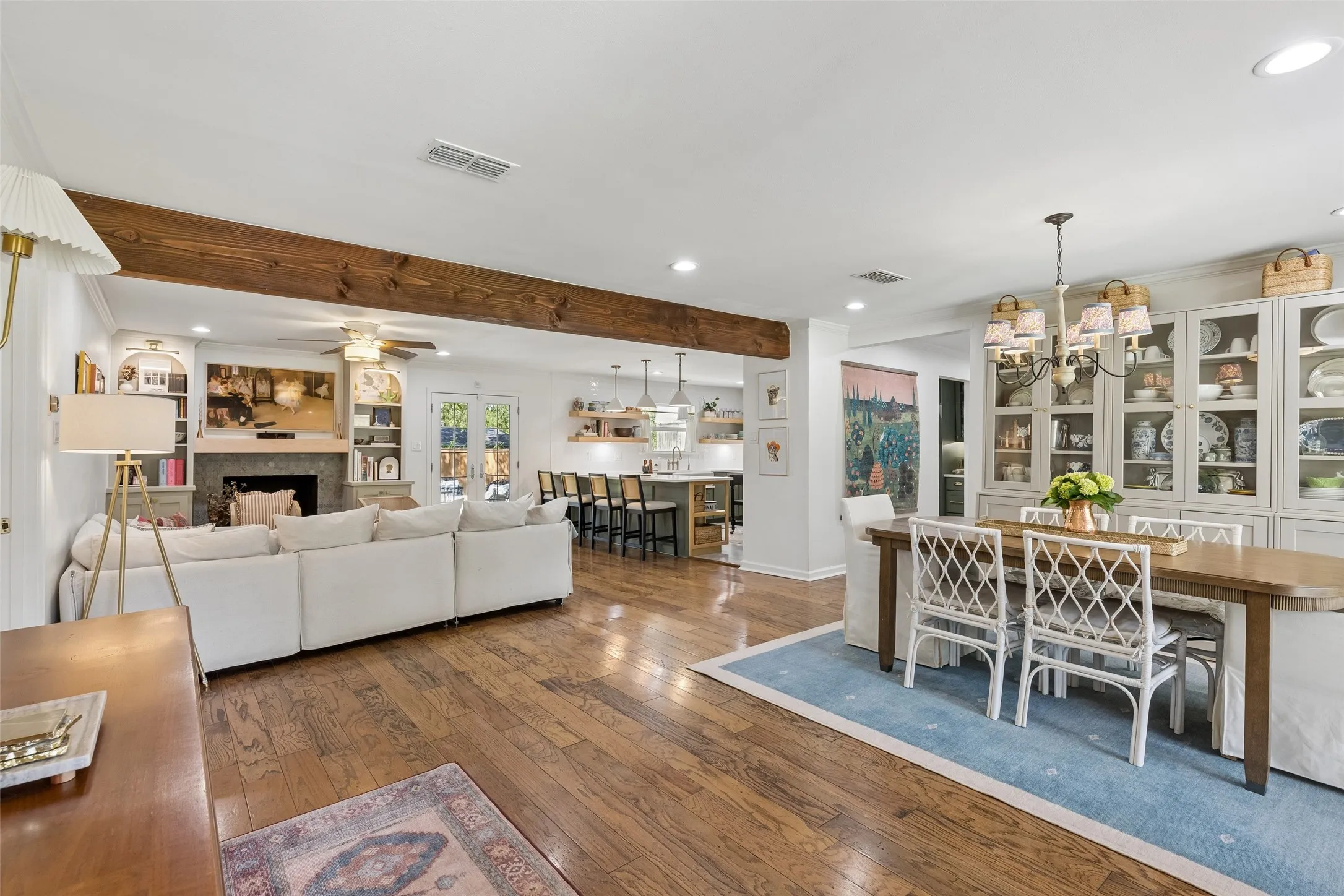 Entry view featuring open floor plan, dining, living and kitchen