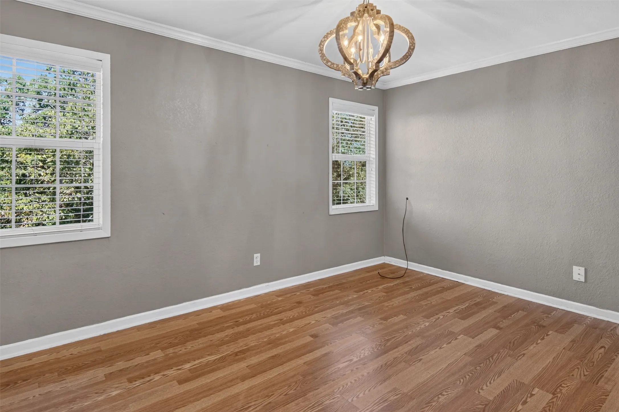 One of two second floor bedrooms