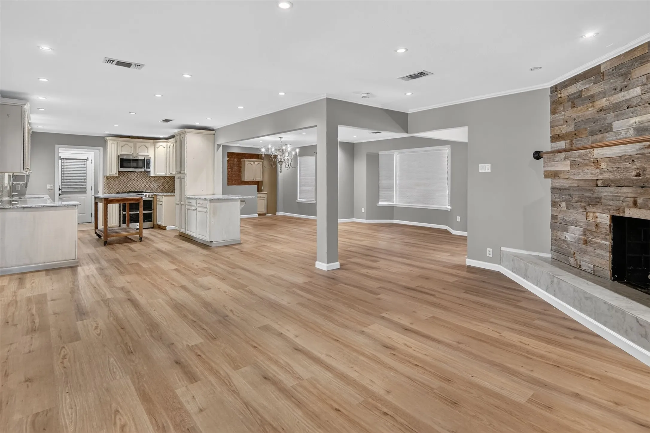 A magnificent view of the living, kitchen and dining area