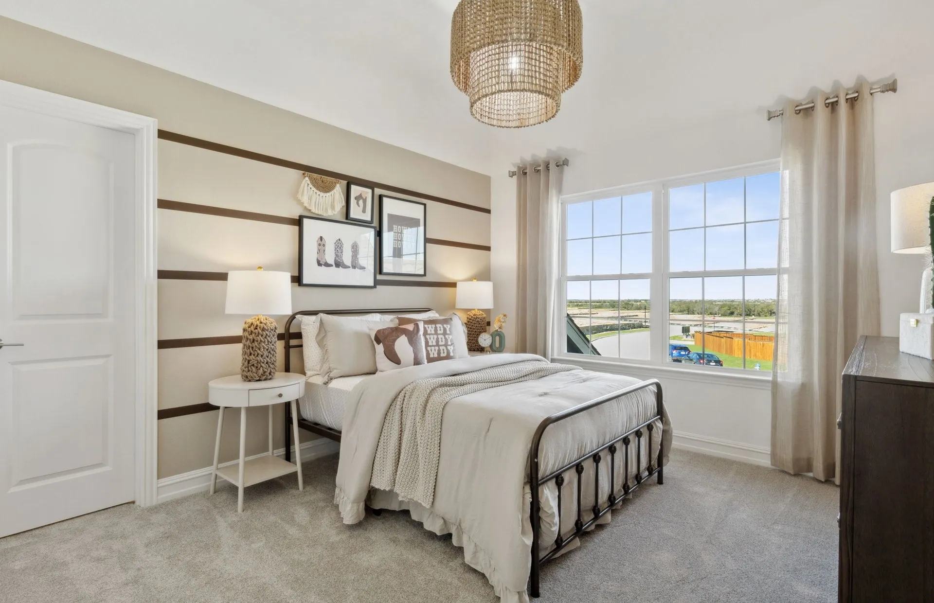 *Model Representation - Spacious secondary bedroom with large windows
