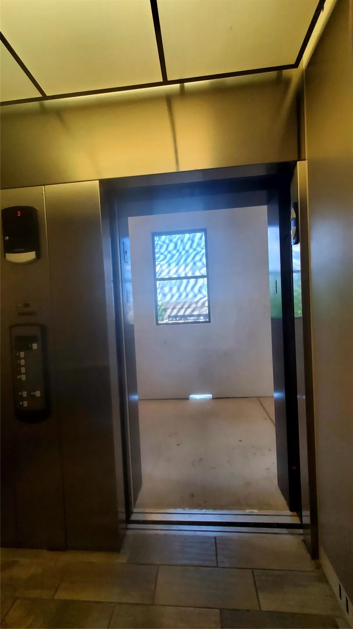 Elevator from Parking Garage / 1st Floor to 3rd floor landing where unit is located.
