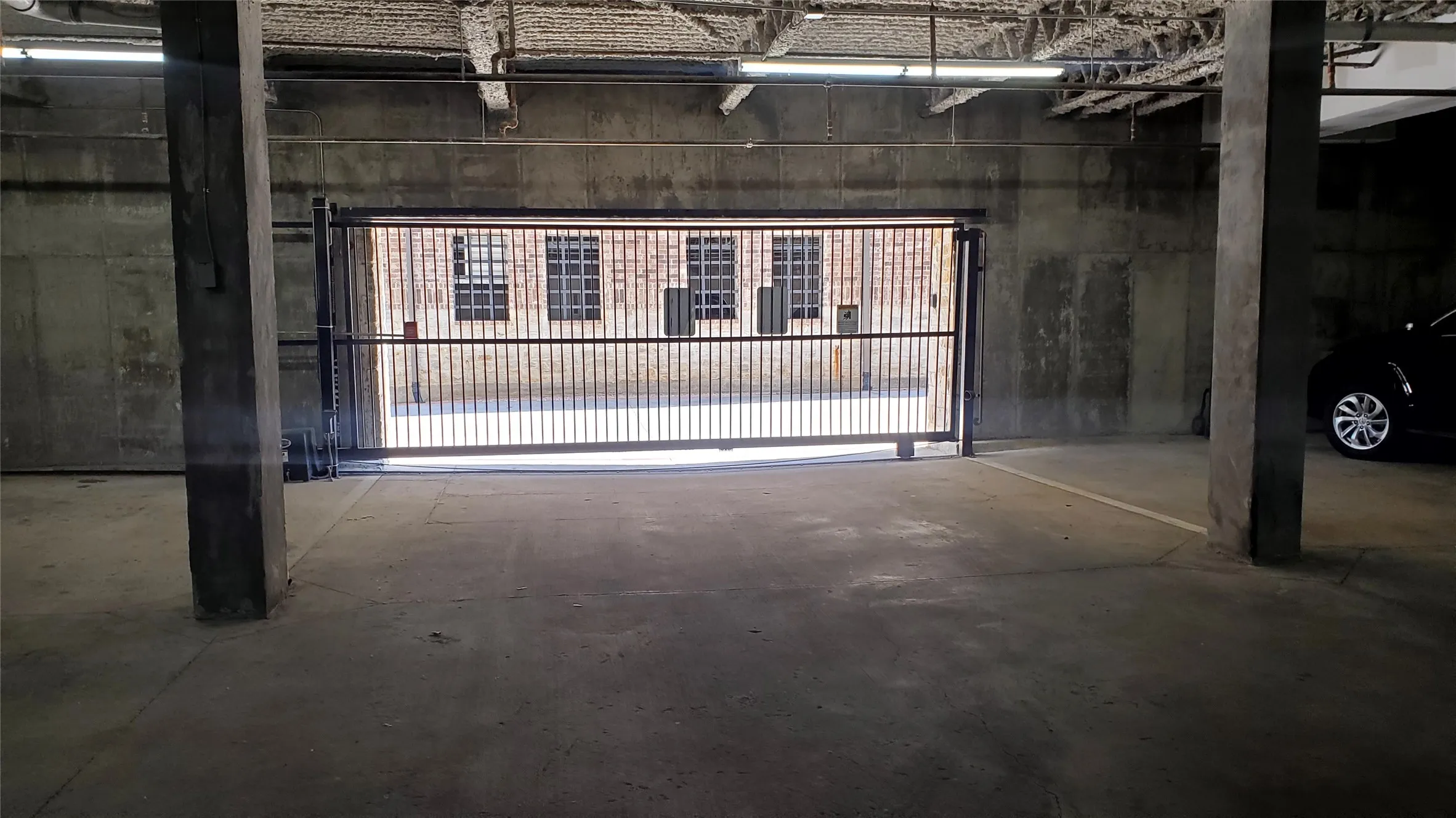 Gated Parking Garage Entrance (2 reserved gated spaces)
