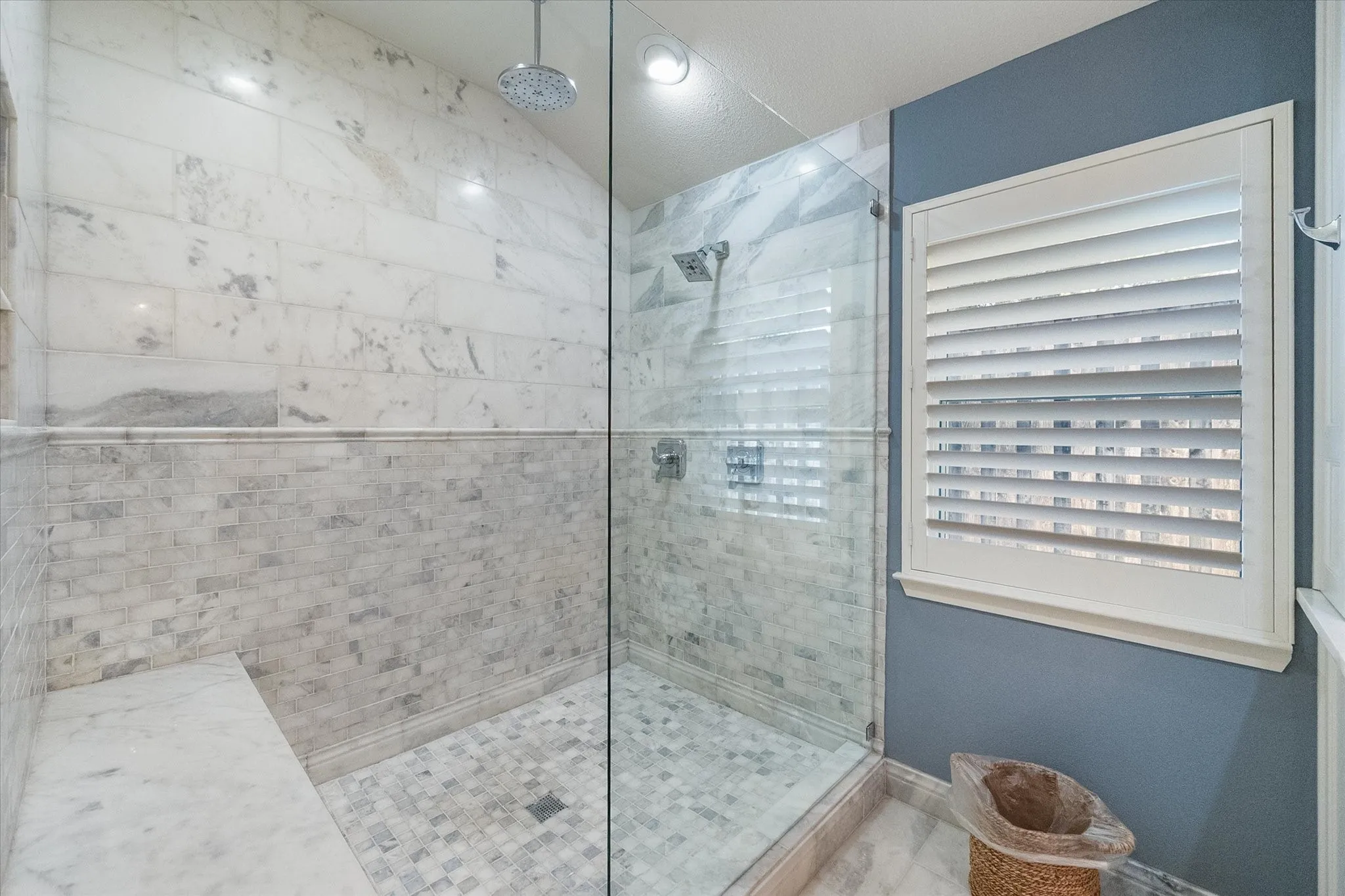 Extra large marble shower with dual heads / separate water lines