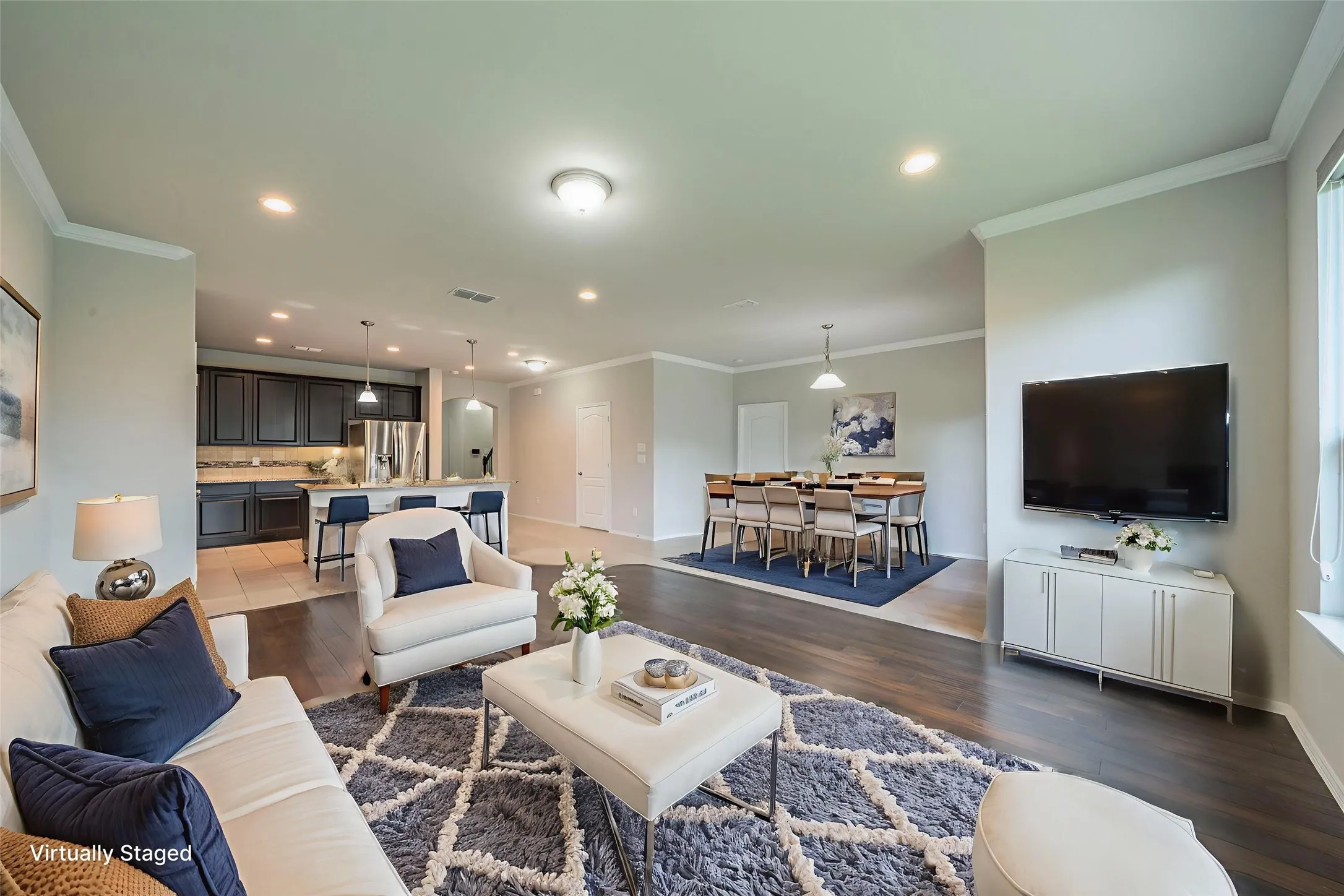 open living, dining and kitchen space