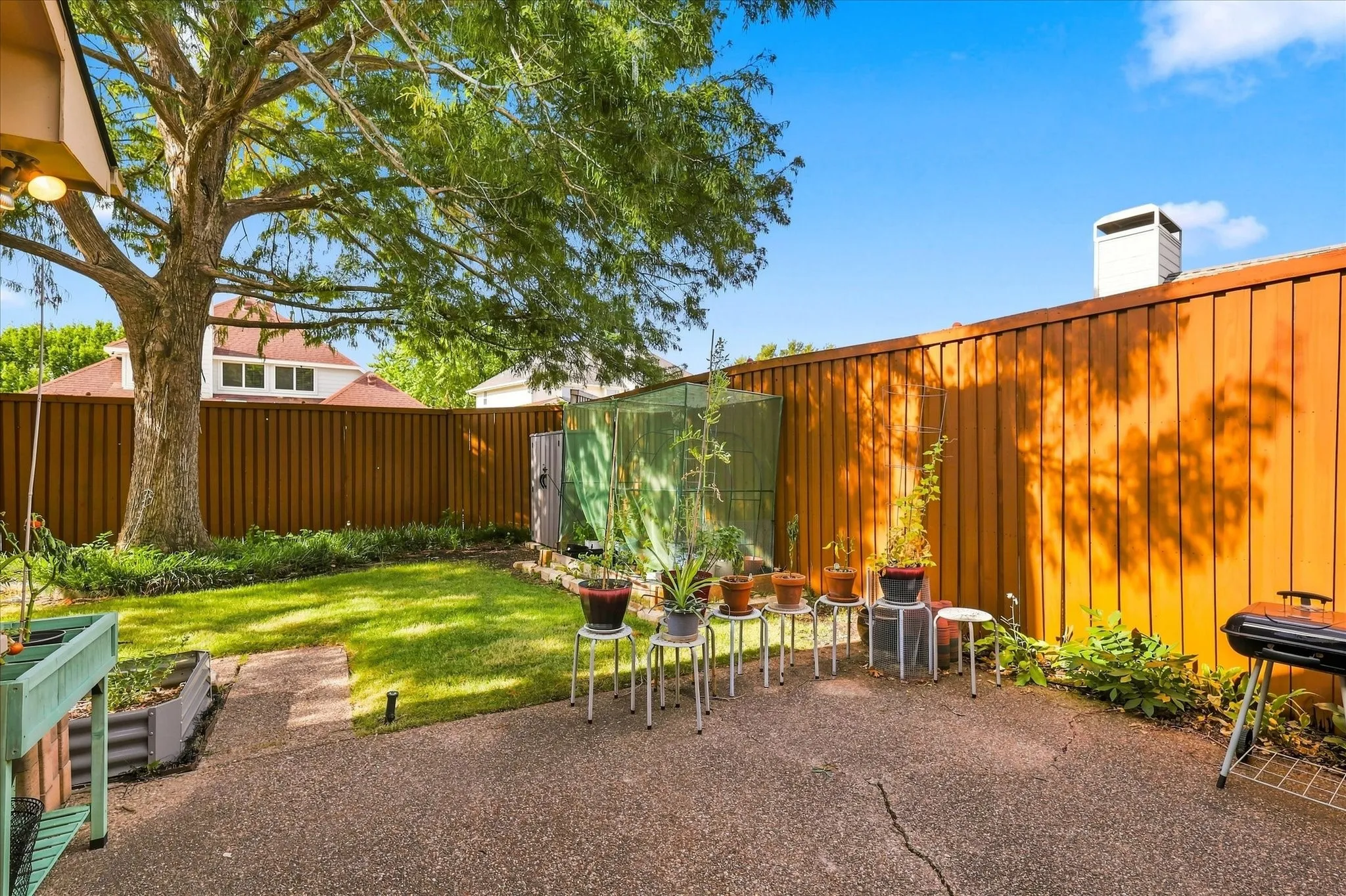 Another view of backyard area with patio area