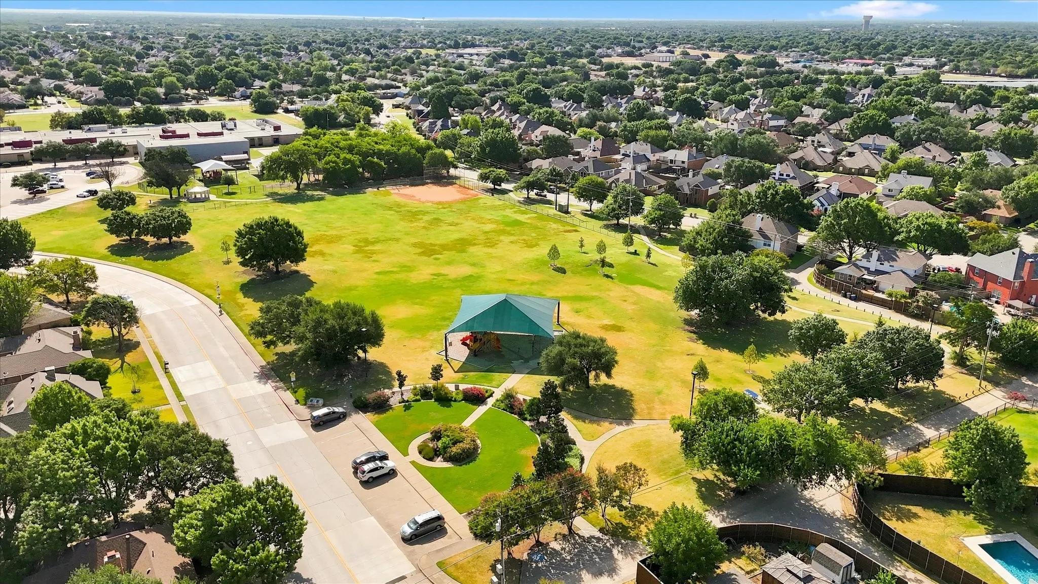 Park, playground, pavilion, ball field and Reed Elementary School with walking distance