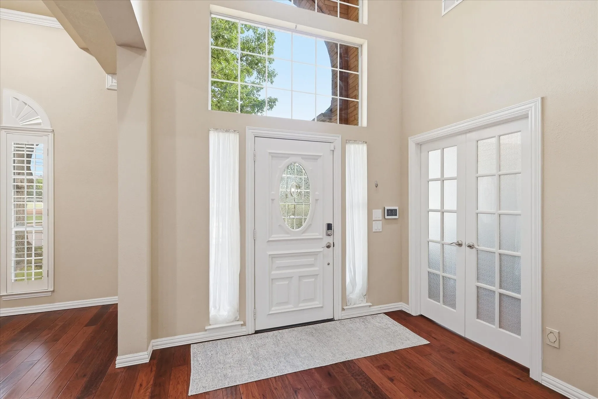 Wide open space to massive entry way. Separate office to the left; Secondary living area to the right