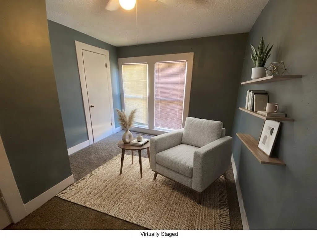 Carpeted flooring, white trim details, and dual windows with blinds