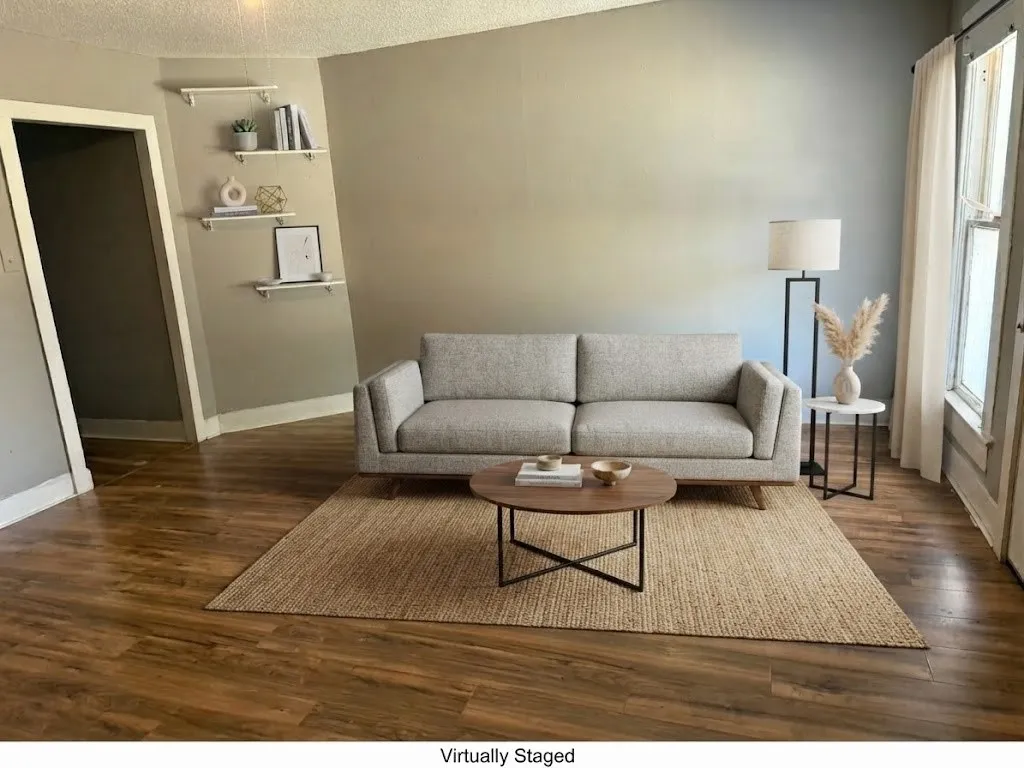 Wood-finish flooring throughout, complemented by a light neutral wall color