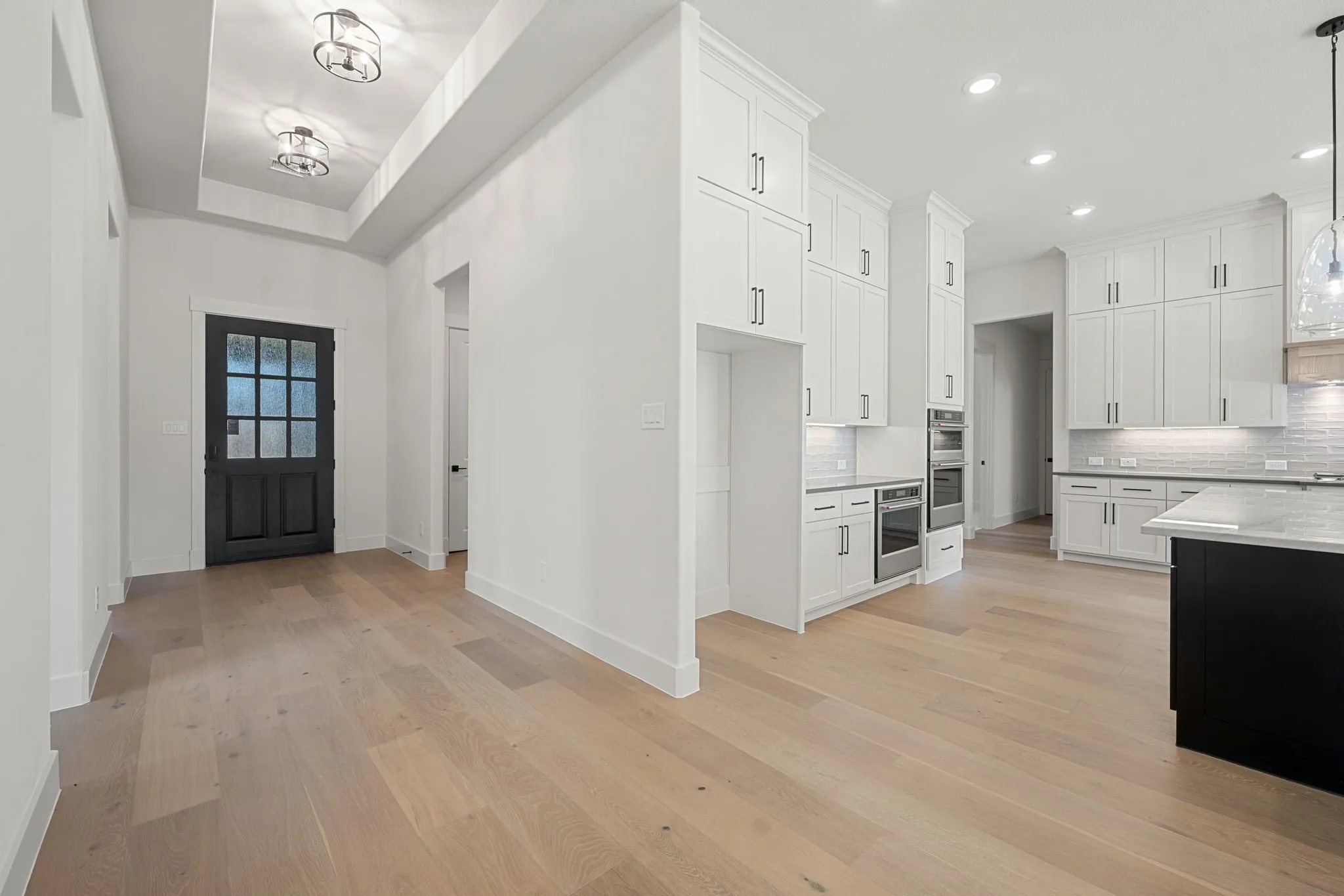 High ceilings and lovely flooring offer an elegant space for you to welcome friends and family into your new dream home!