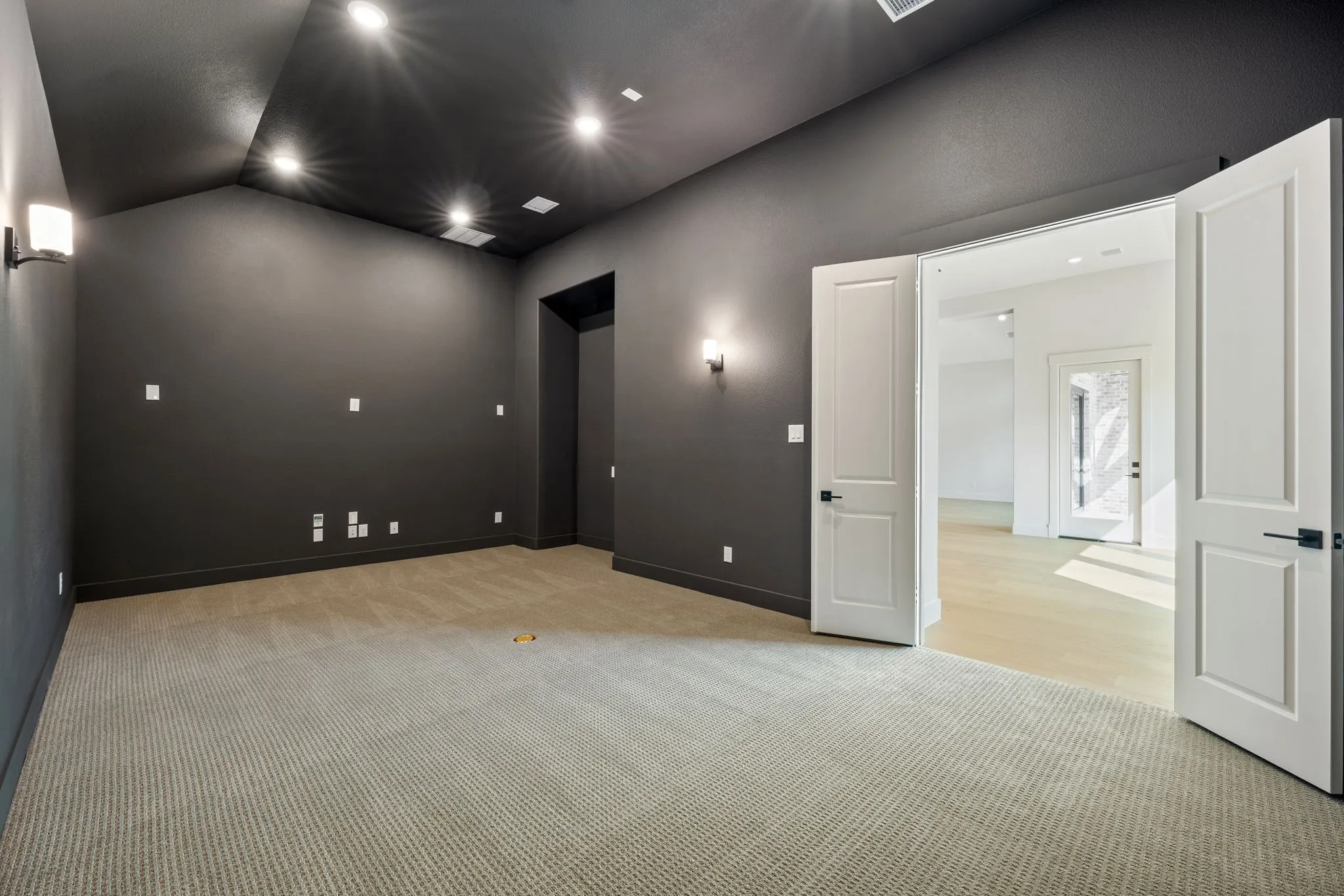 This spacious media room is the perfect place to host family movie night!