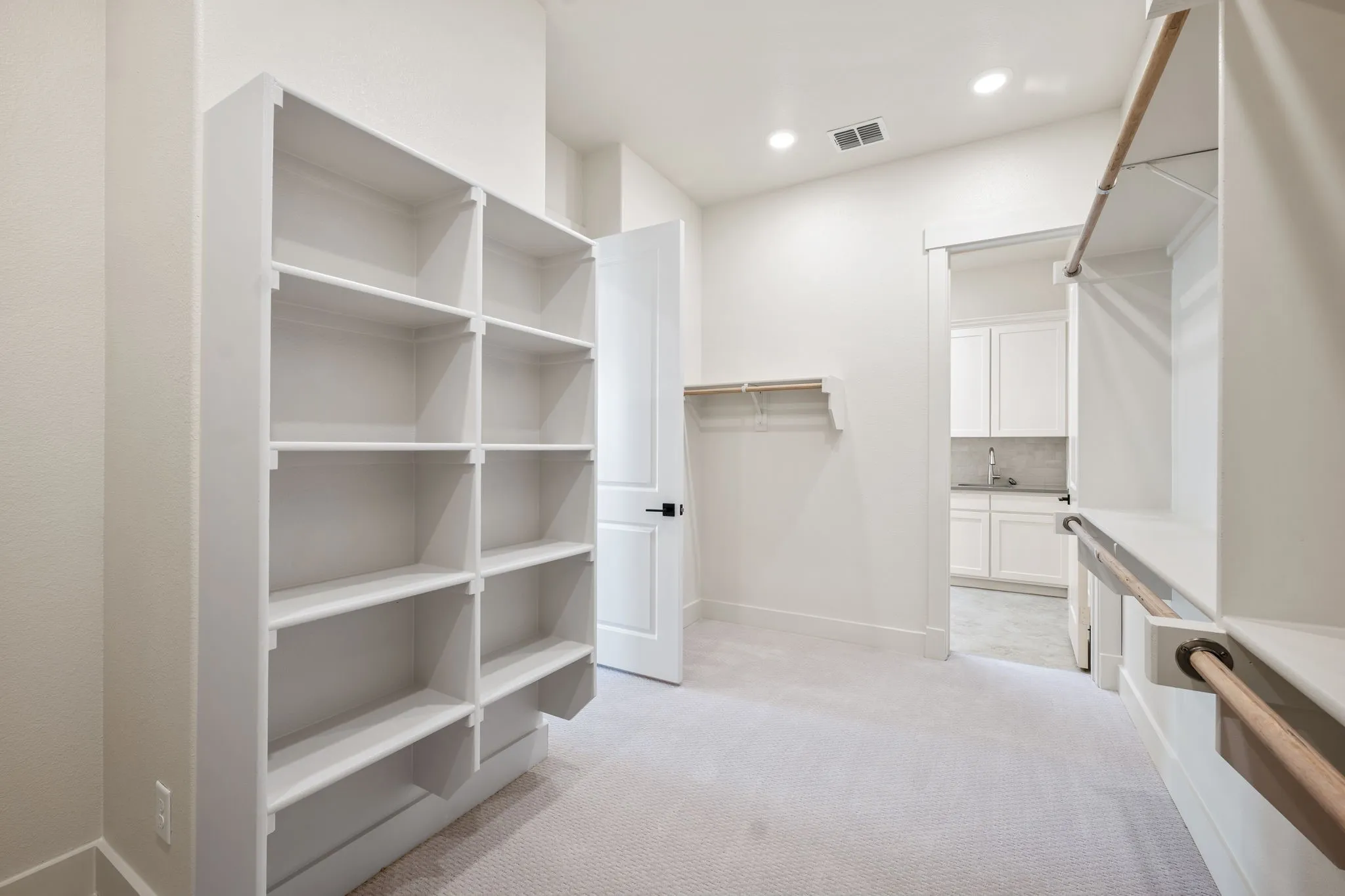 You'll enjoy the convenience of the owner's closet being connected to the laundry room when you call this dream home your own!